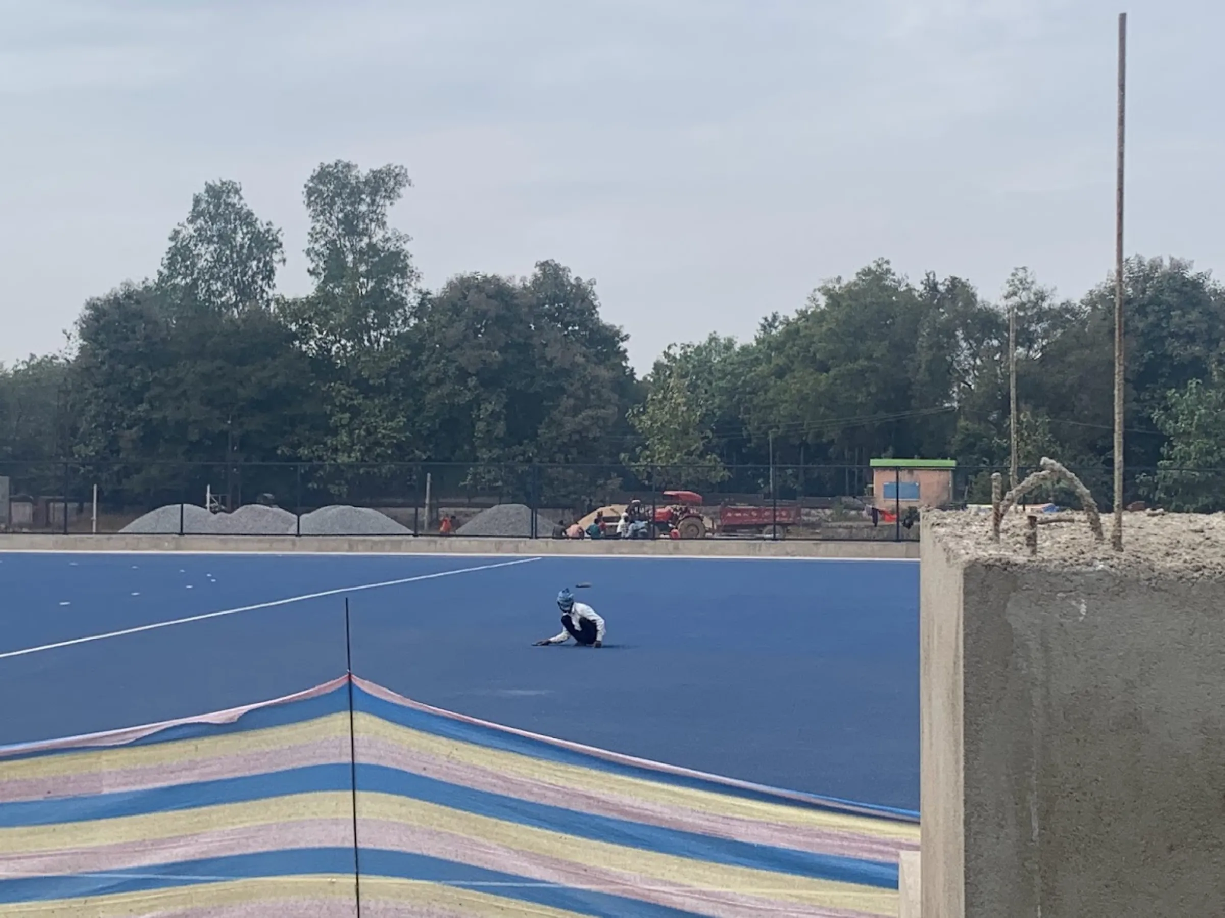 An under construction hockey ground in Balishankara in eastern Odisha, India, December 11, 2022. Anuradha Nagaraj/Thomson Reuters Foundation