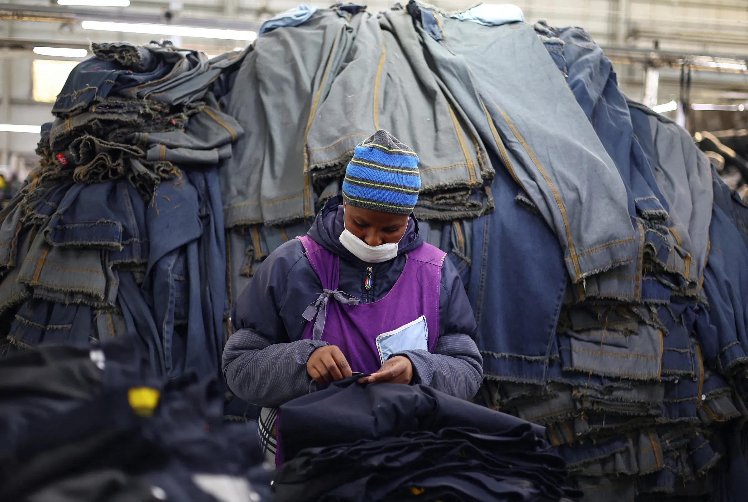 A person works at the Afri-Expo Textile Factory on the outskirts of Maseru, the capital of Lesotho, August 4, 2025. REUTERS/Siphiwe Sibeko