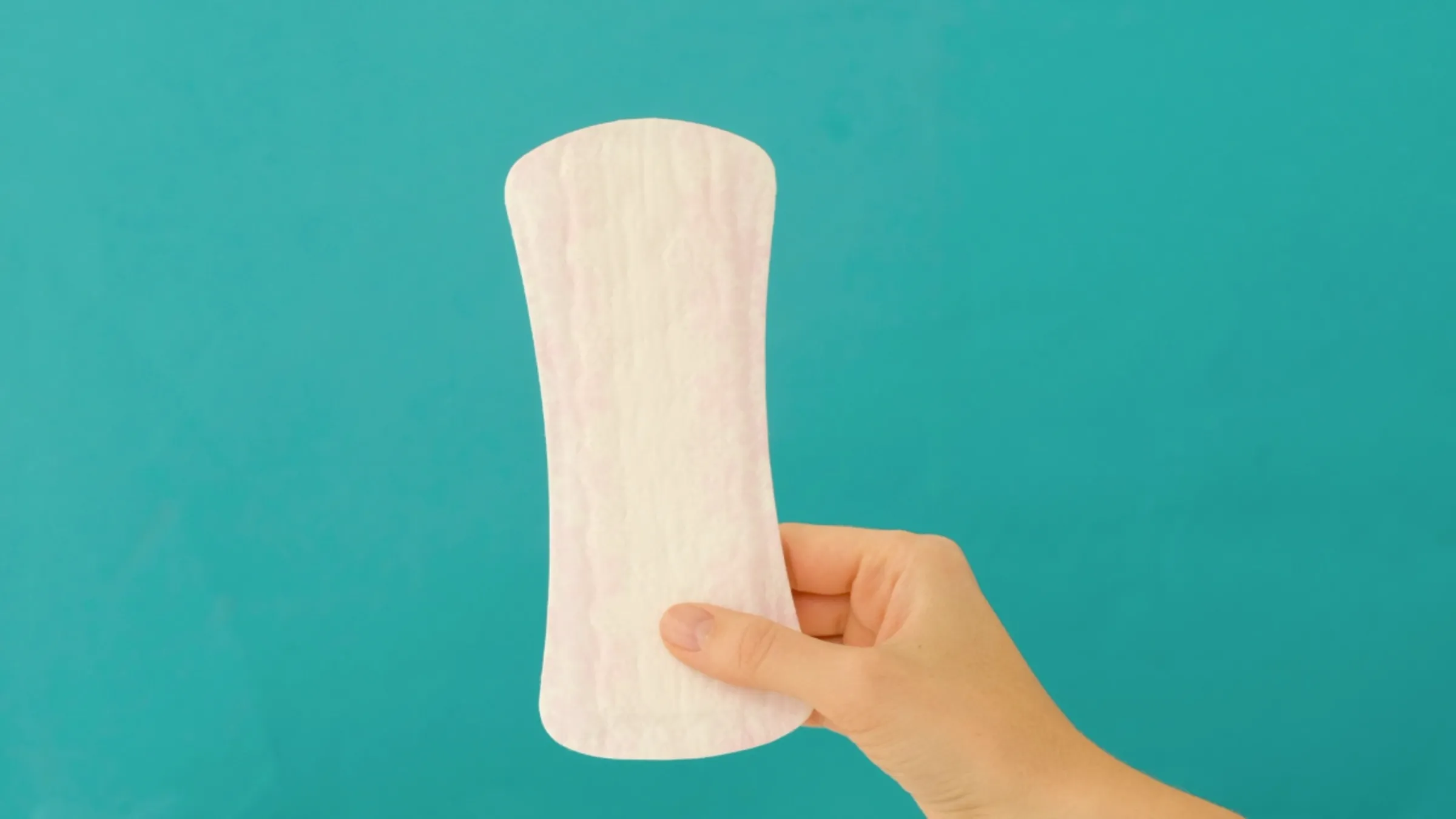 A menstruation pad is seen in this video still