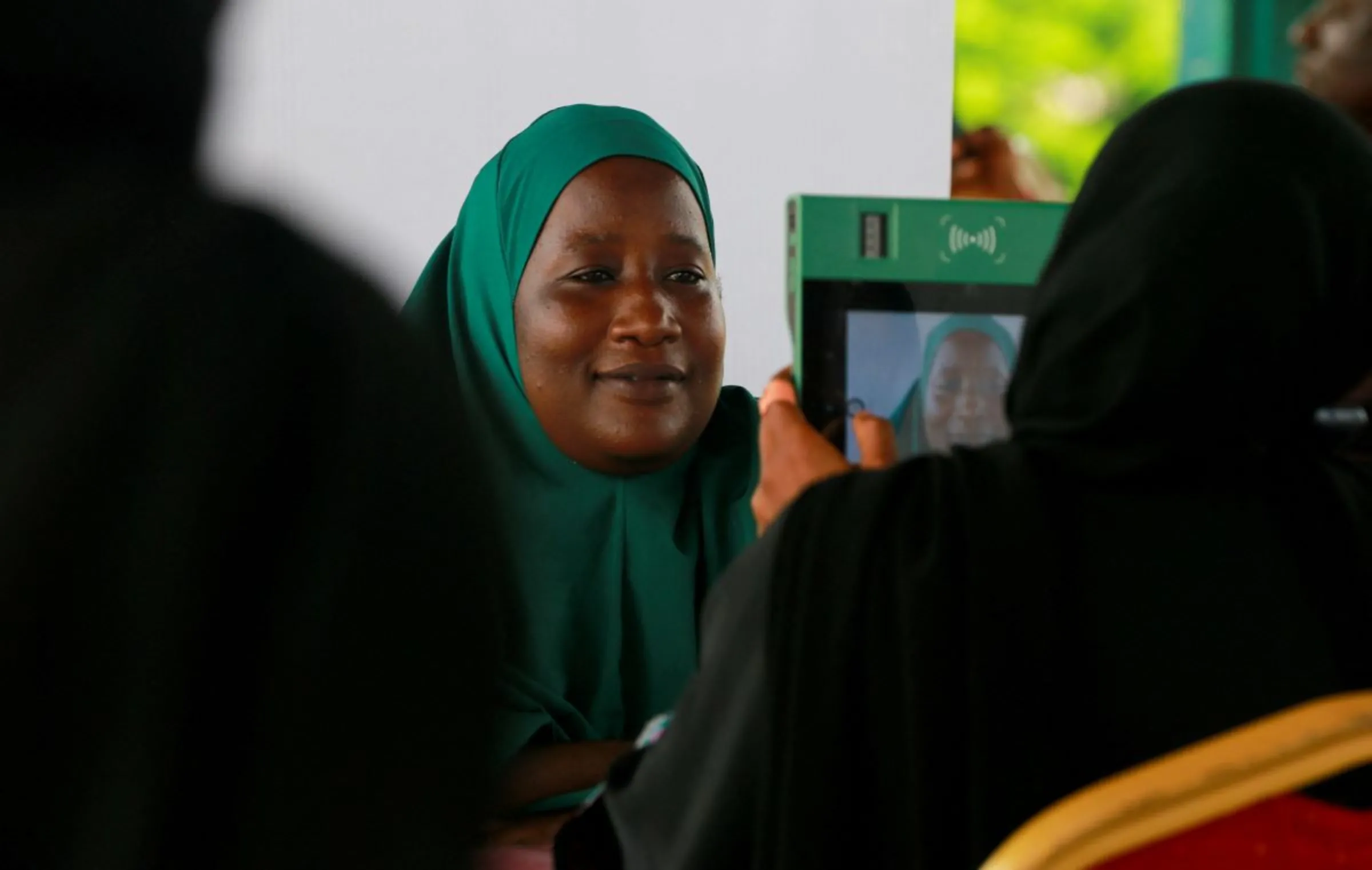 A woman gets herself registered during the INEC voters registration exercise at the Area 10 centre in Abuja, Nigeria June 23, 2022. REUTERS/Afolabi Sotunde