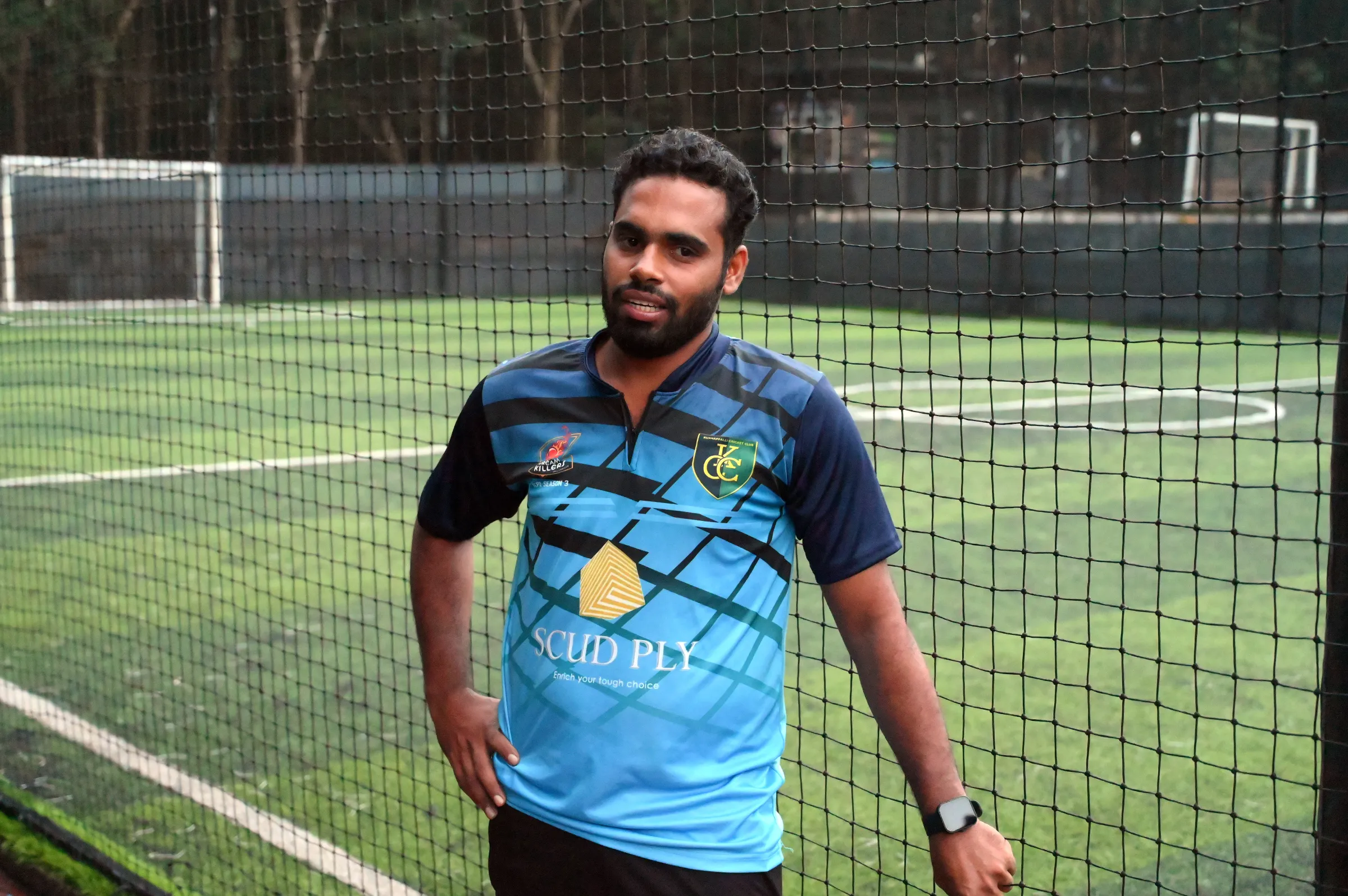 Ali Aksar poses for a picture outside a turf football ground in Perithalmanna, India, August 29, 2022. Thomson Reuters Foundation/Gokul