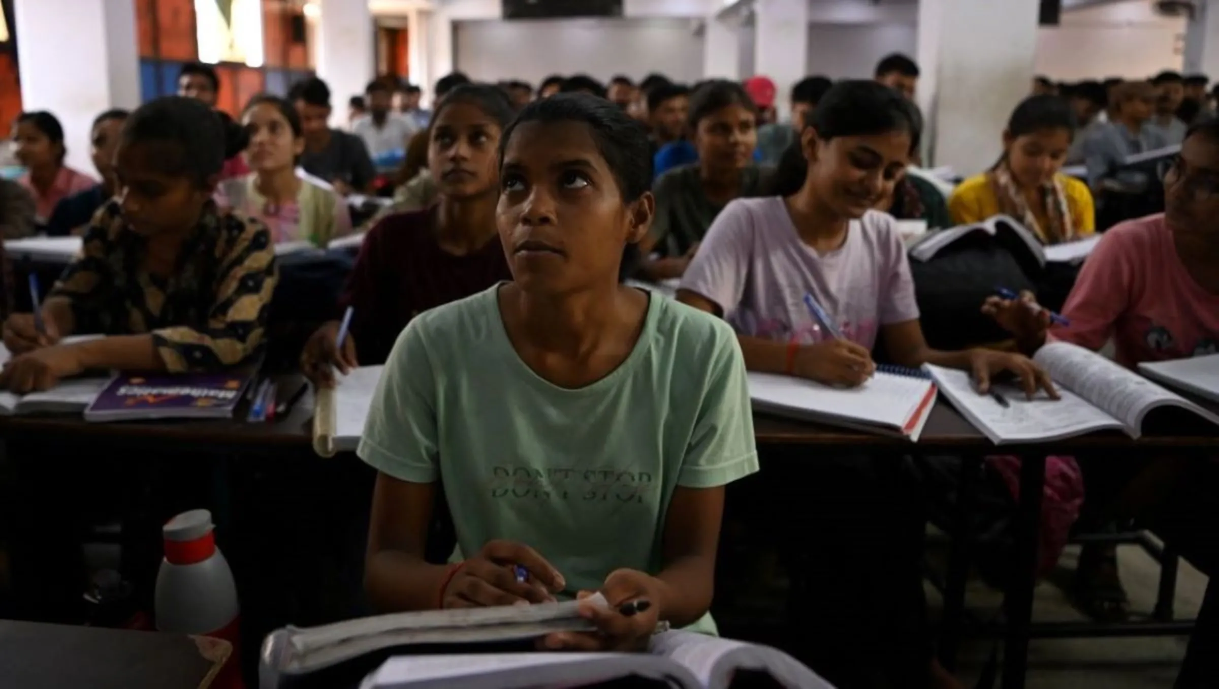 Students attend a class at Super Climax Academy, a coaching institute training students to prepare for competitive examinations to secure government jobs, in Prayagraj, India, June 21, 2024. REUTERS/Sahiba Chawdhary