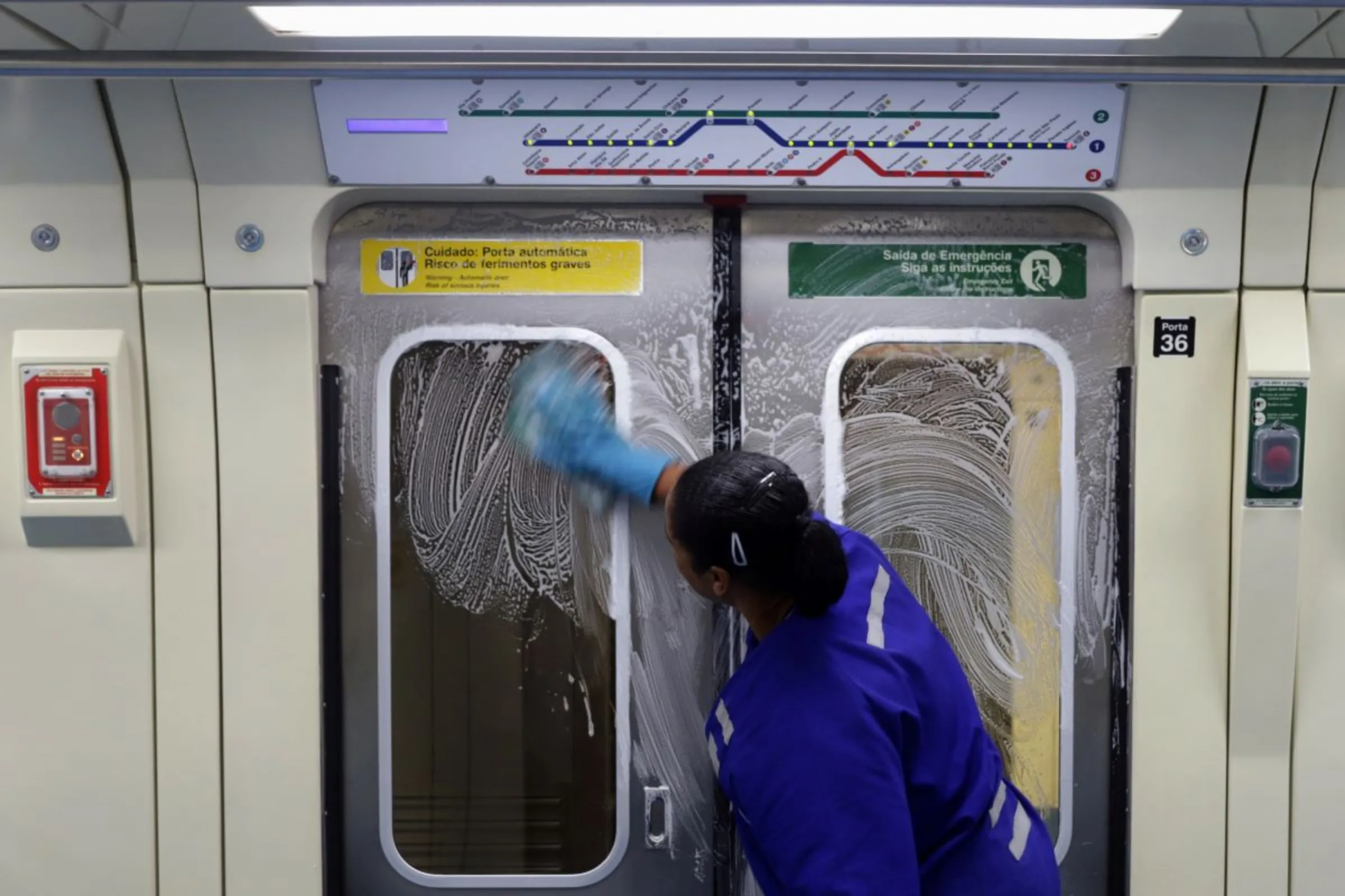 A cleaner works on the disinfection of a subway train as a measure against the coronavirus disease (COVID-19) in Sao Paulo, Brazil, March 17, 2020