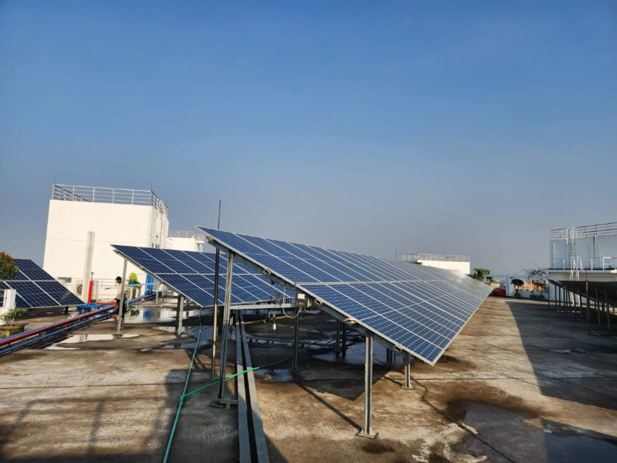 Solar panels at Snowtex Group at two LEED-platinum-certified RMG factories. These two panels can together generate 75 megawatts of energy in a month, providing about 10% of energy needed to run the facilities. Dhamrai, Bangladesh, June 30, 2023