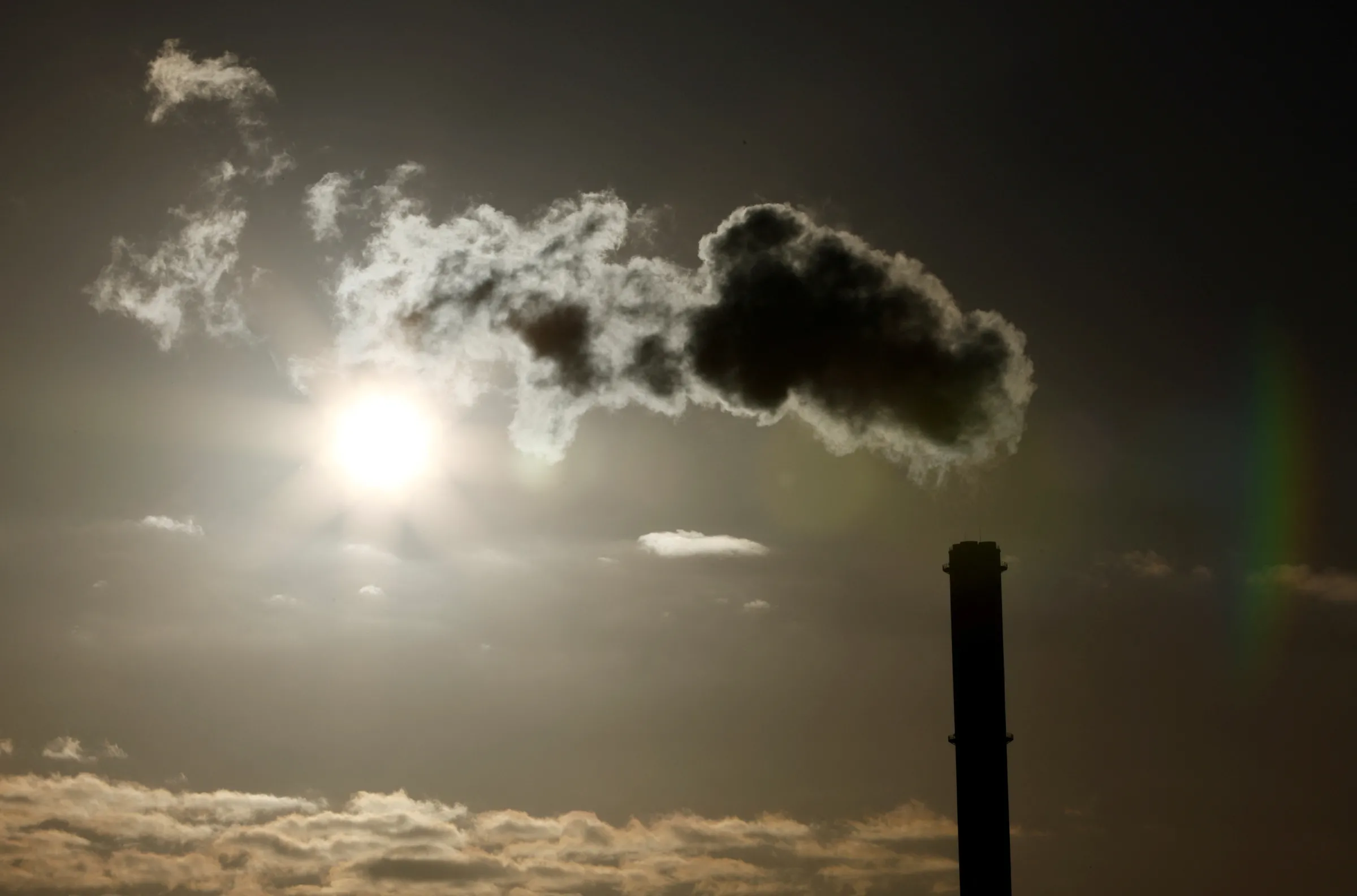 A view shows emissions from the smoke stack of the Electricite de France (EDF) coal-fired power plant in Cordemais near Nantes, France, January 20, 2022. REUTERS/Stephane Mah