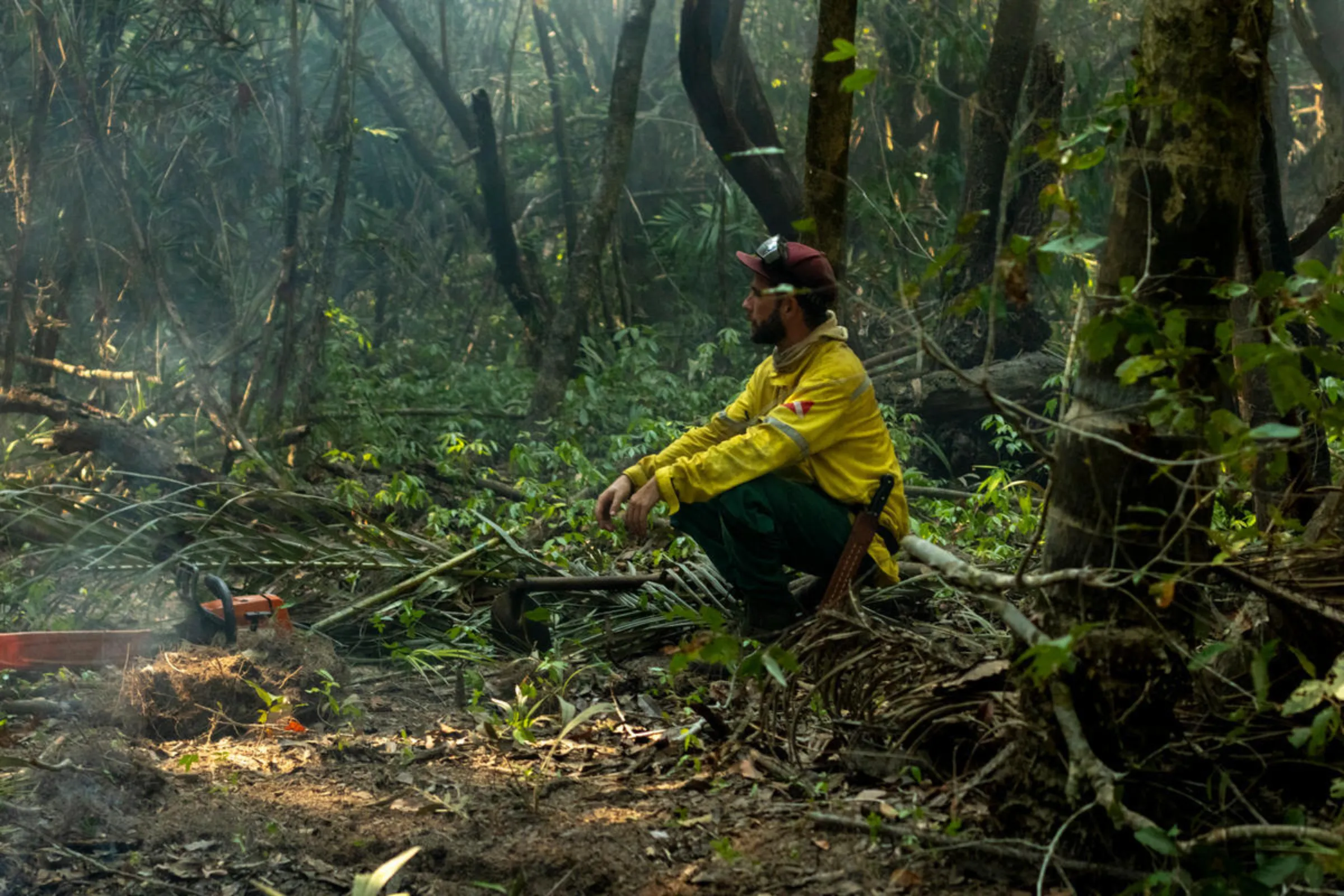 Firefighters from the Bridada de Alter use fire management techniques to protect areas of ecological interest in Alter do Chao, Para State, Brazil. August 1, 2024. Brigada de Alter/Handout via Thomson Reuters Foundation