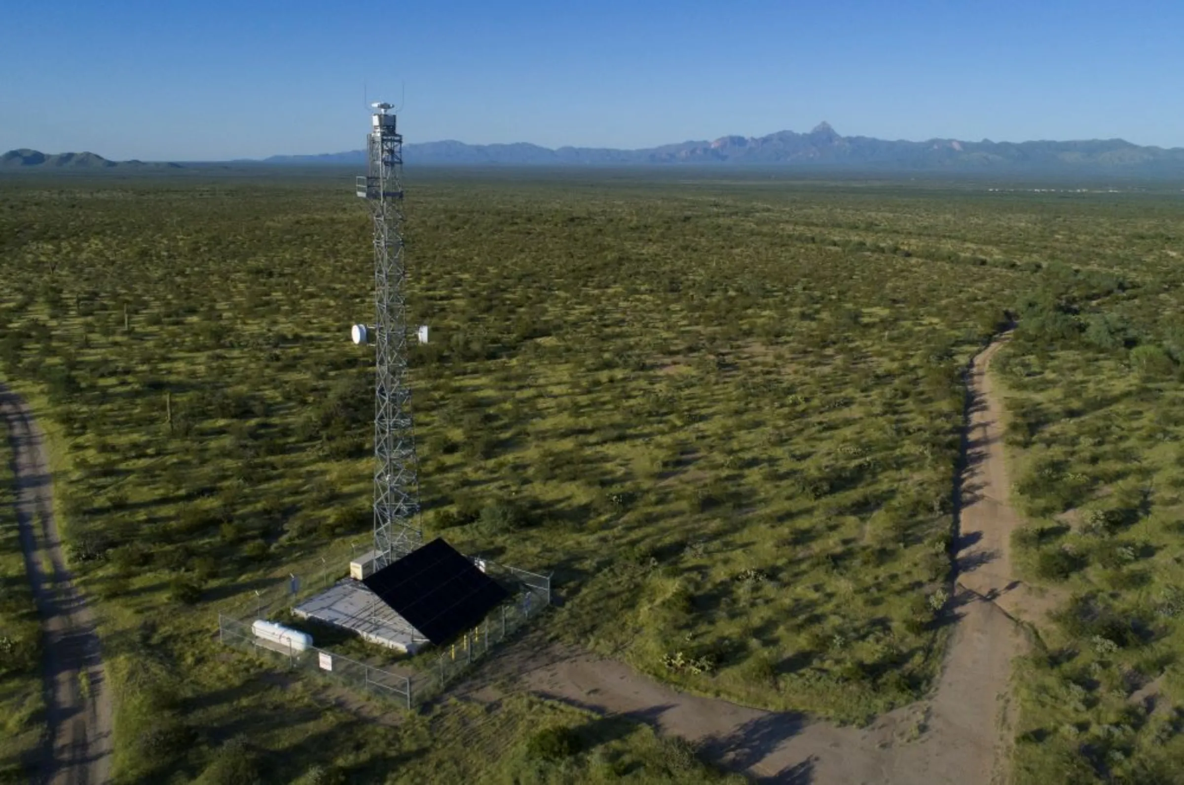 An integrated fixed tower (IFT) surveils the desert near the U.S./Mexico border on Tohono O’odham Nation lands, Arizona, U.S., August 31, 2022