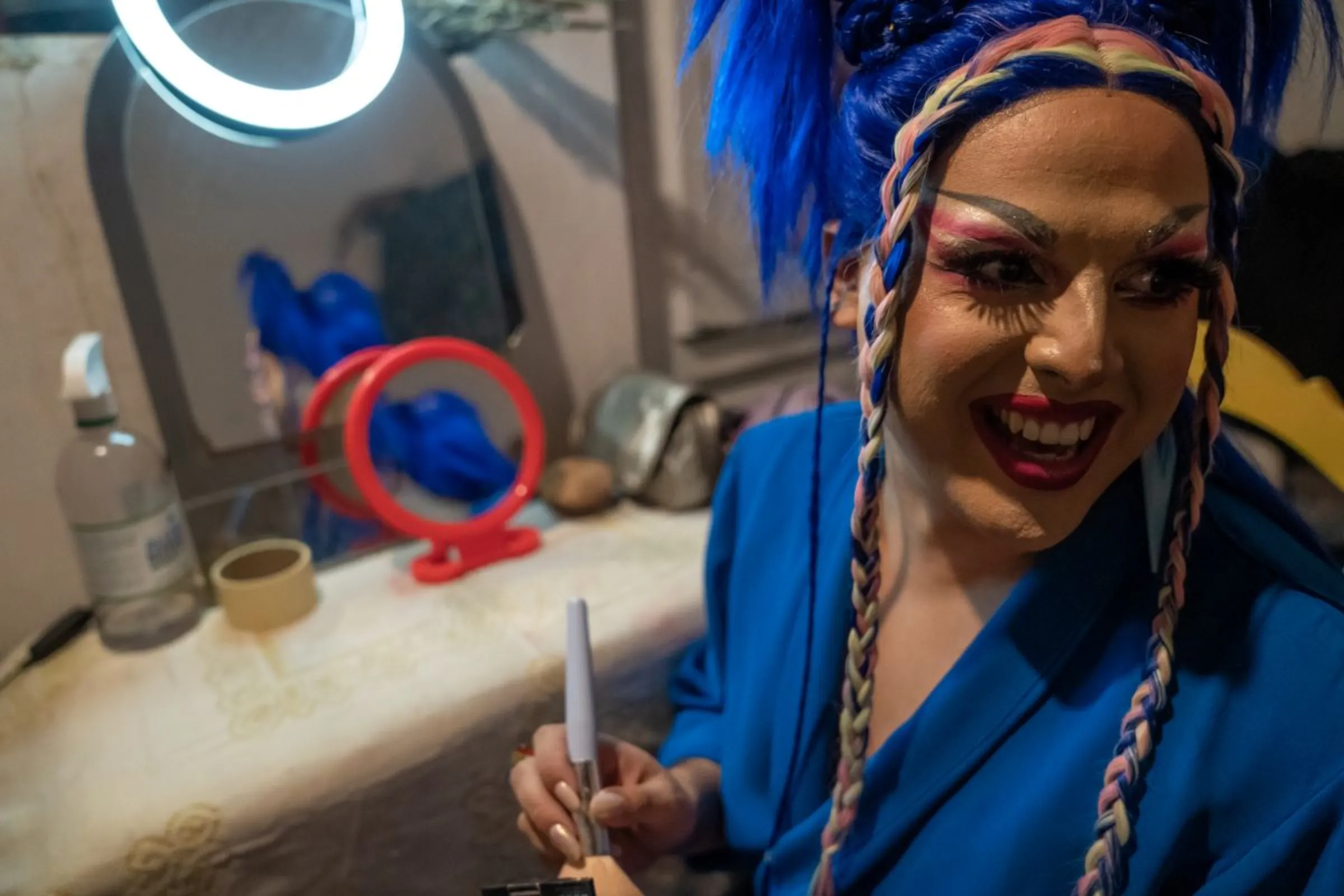 Dislexia Severa smiles backstage before walking the runway at a late-night drag show in Asunción, Paraguay, February 22, 2023