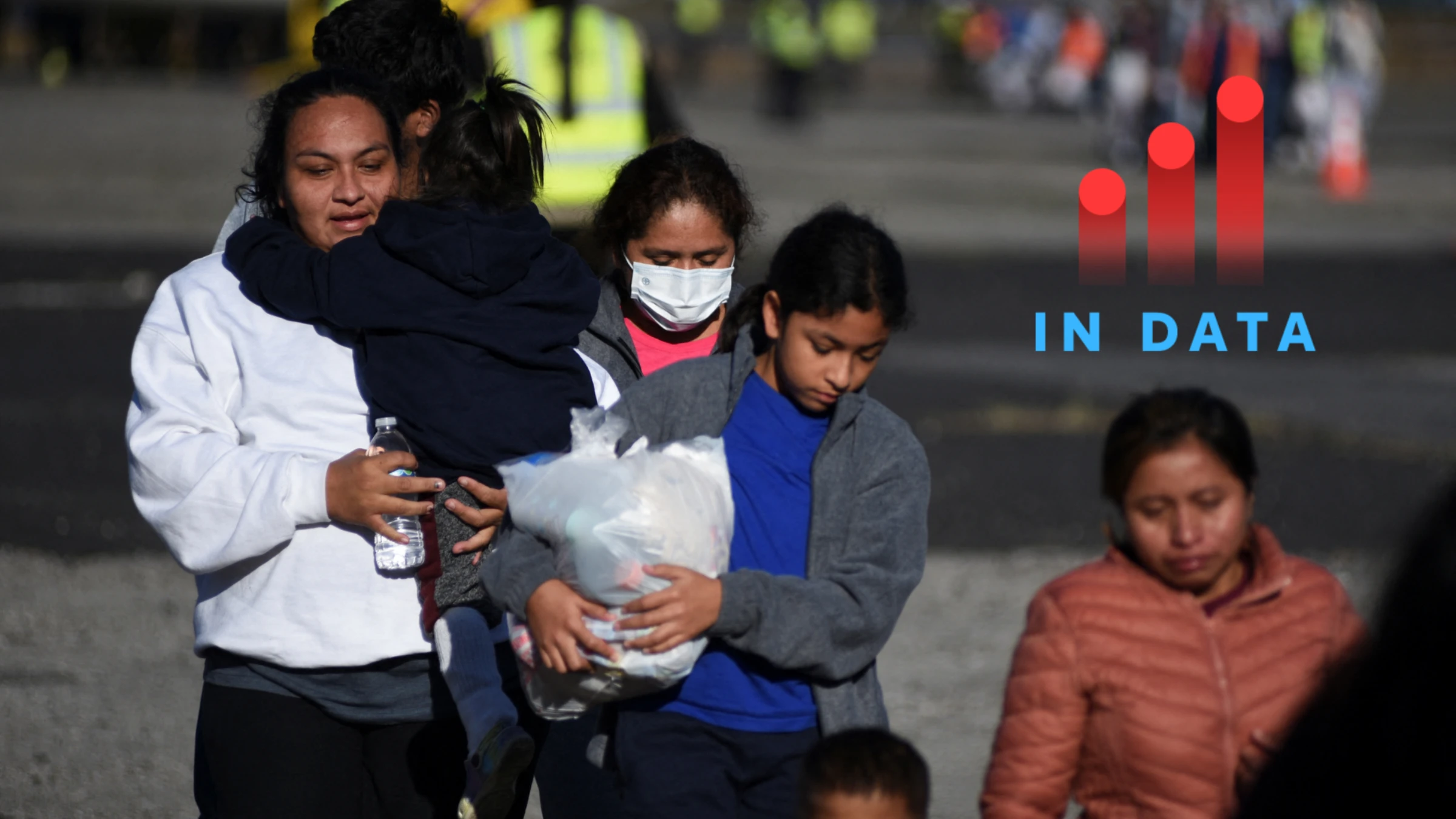 Guatemalan migrants walk after arriving at La Aurora Air Force Base on a deportation flight from the U.S., in Guatemala City, Guatemala, December 27, 2024. REUTERS/Cristina Chiquin