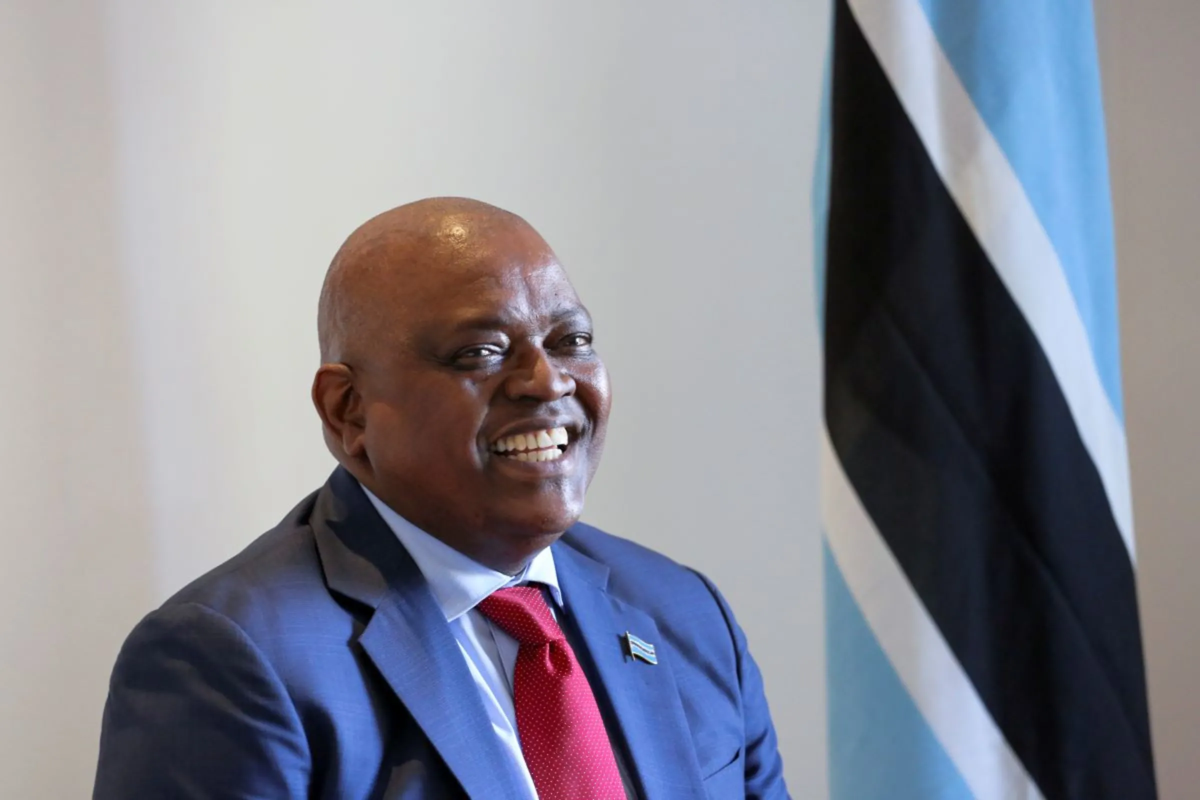 Botswana President Mokgweetsi Masisi reacts while speaking to Reuters at the One & Only Hotel as the African Mining Indaba 2022 takes place, in Cape Town, South Africa, May 10, 2022. REUTERS/Shelley Christians