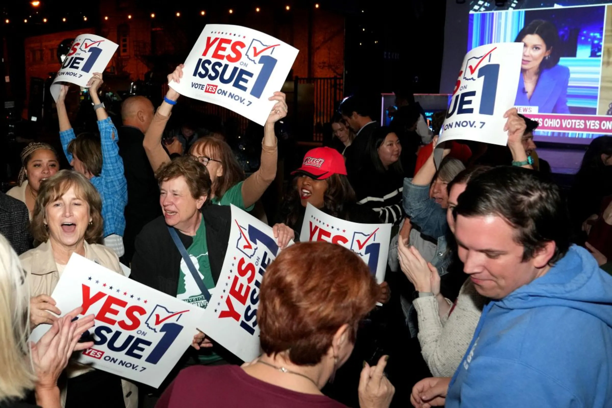 Supporters react to the passage of Ohio Issue 1, a ballot measure to amend the state constitution and establish a right to abortion, at an election night party hosted by the Hamilton County Democratic Party at Knox Joseph Distillery in the Over-the-Rhine neighborhood of Cincinnati, Ohio, U.S. November 7, 2023
