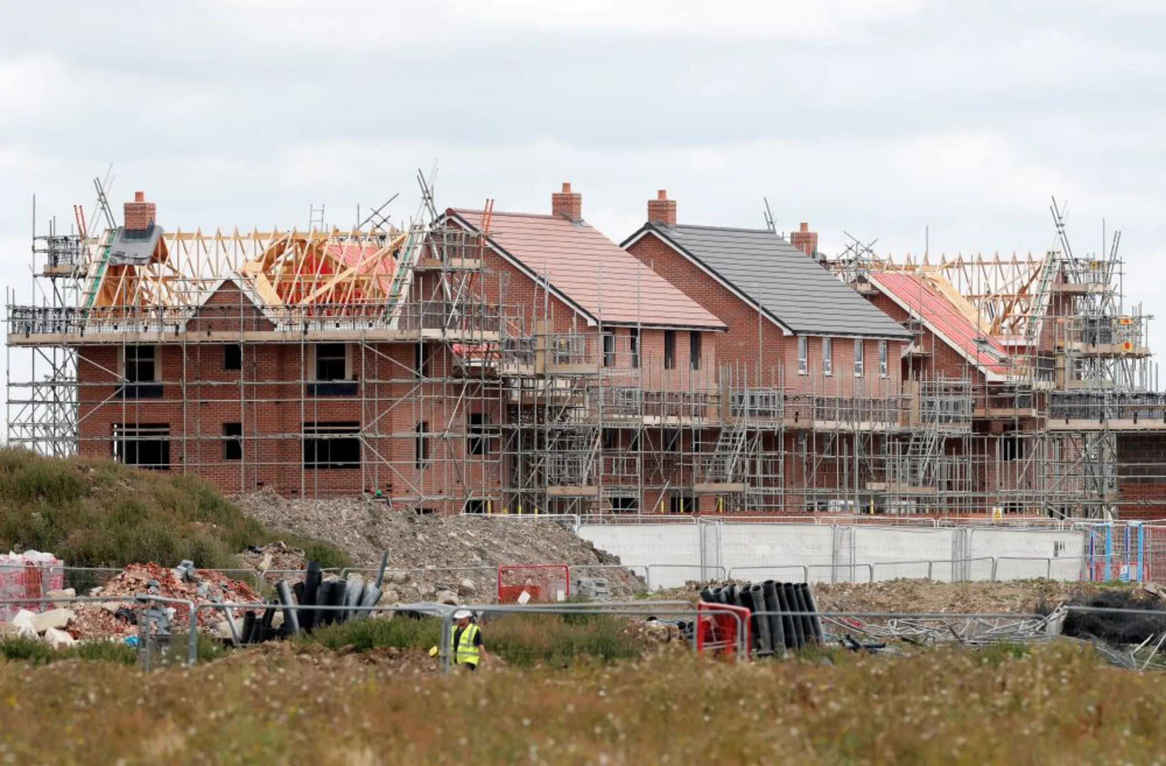 New houses under construction are pictured in Aylesbury, Britain August 6, 2020