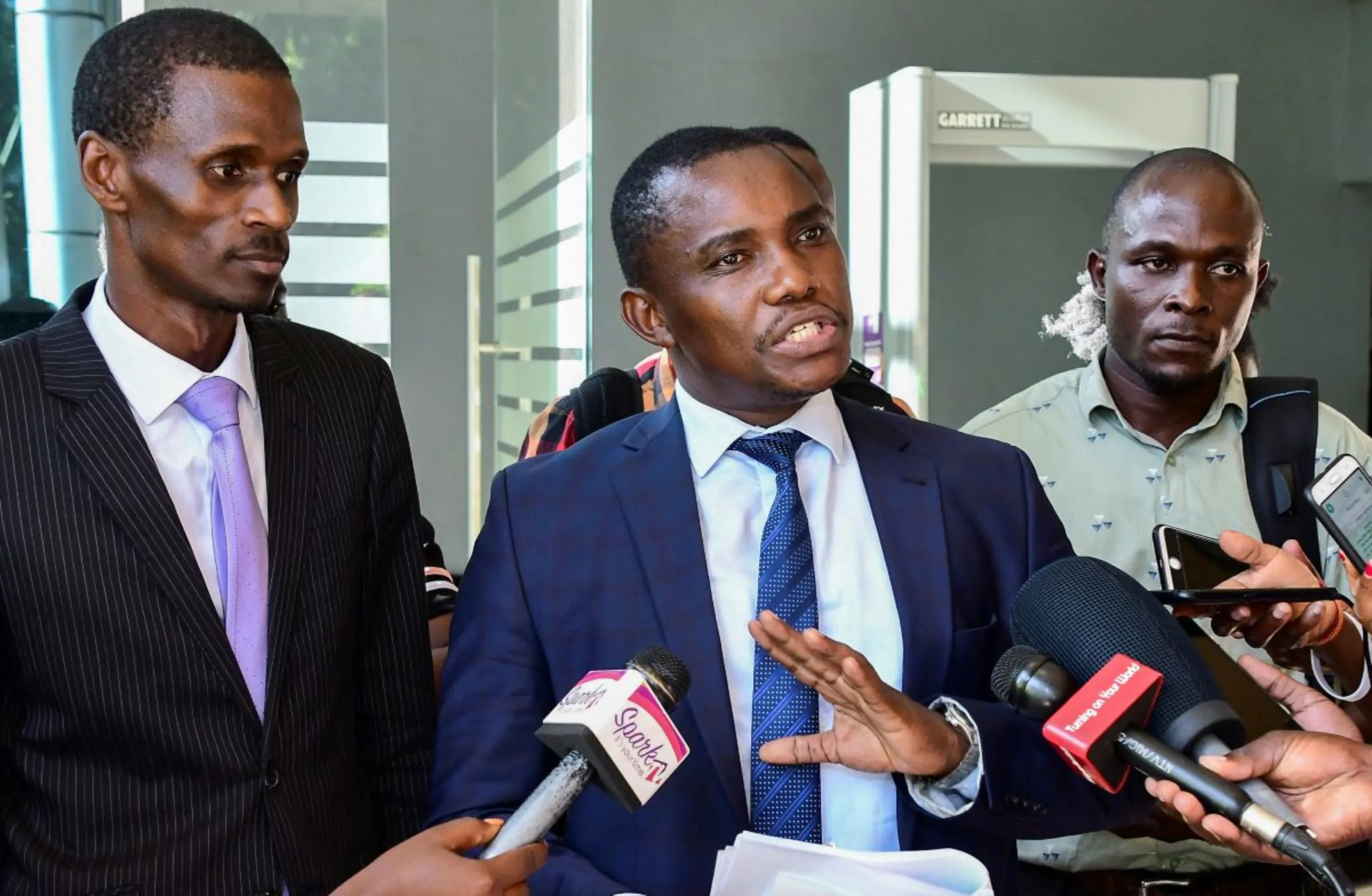 Ugandan human rights lawyer talks to the media after challenging the signing of the new Anti-homosexuality law in Kampala, Uganda May 29, 2023. REUTERS/Abubaker Lubowa