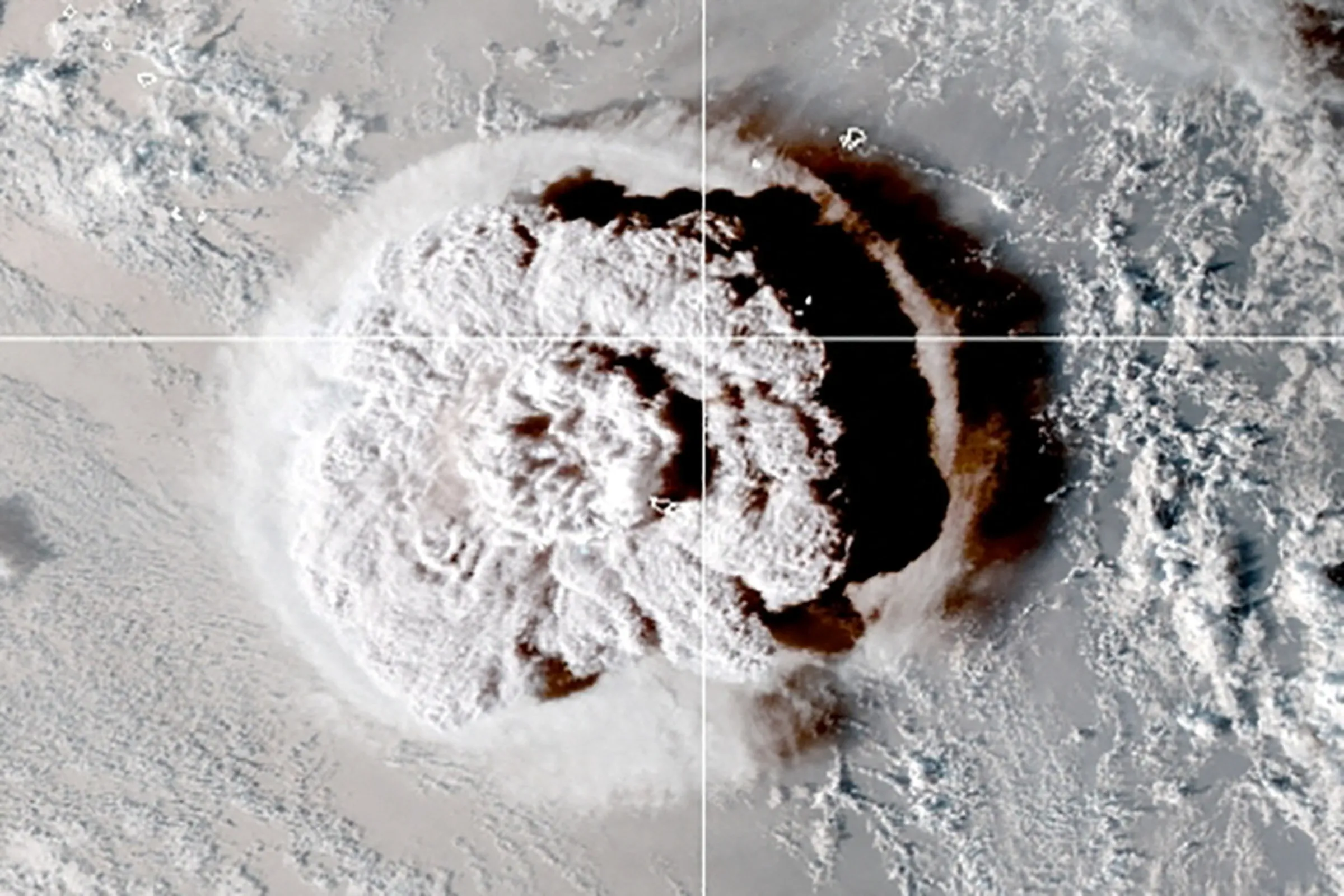 The eruption of an underwater volcano off Tonga, which triggered a tsunami warning for several South Pacific island nations, is seen in an image from the NOAA GOES-West satellite taken at 05:00 GMT January 15, 2022. CIRA/NOAA/Handout via REUTERS