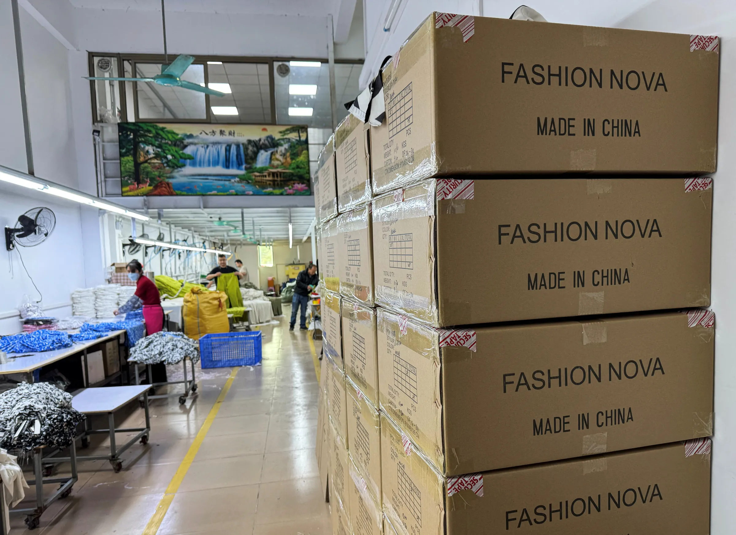 Boxes of clothing for export are pictured at a clothing factory in Guangzhou, Guangdong province, China April 1, 2025. REUTERS/Sophie Yu