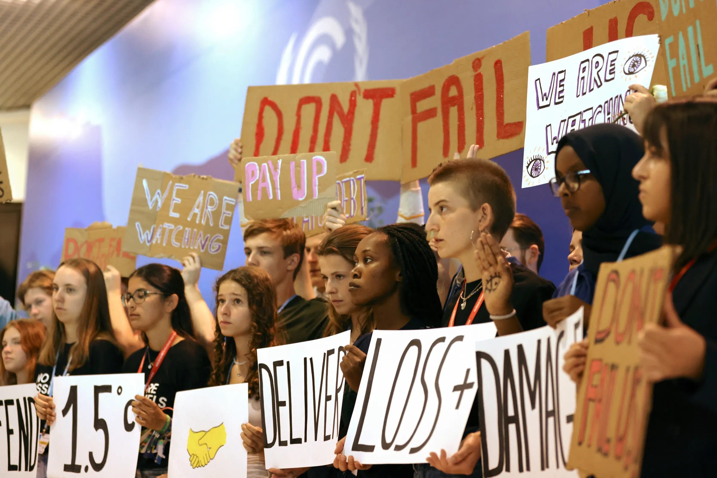 Climate activists take part in a protest, during the COP27 climate summit, in Sharm el-Sheikh, Egypt, November 19, 2022. REUTERS/Mohamed Abd El Ghany