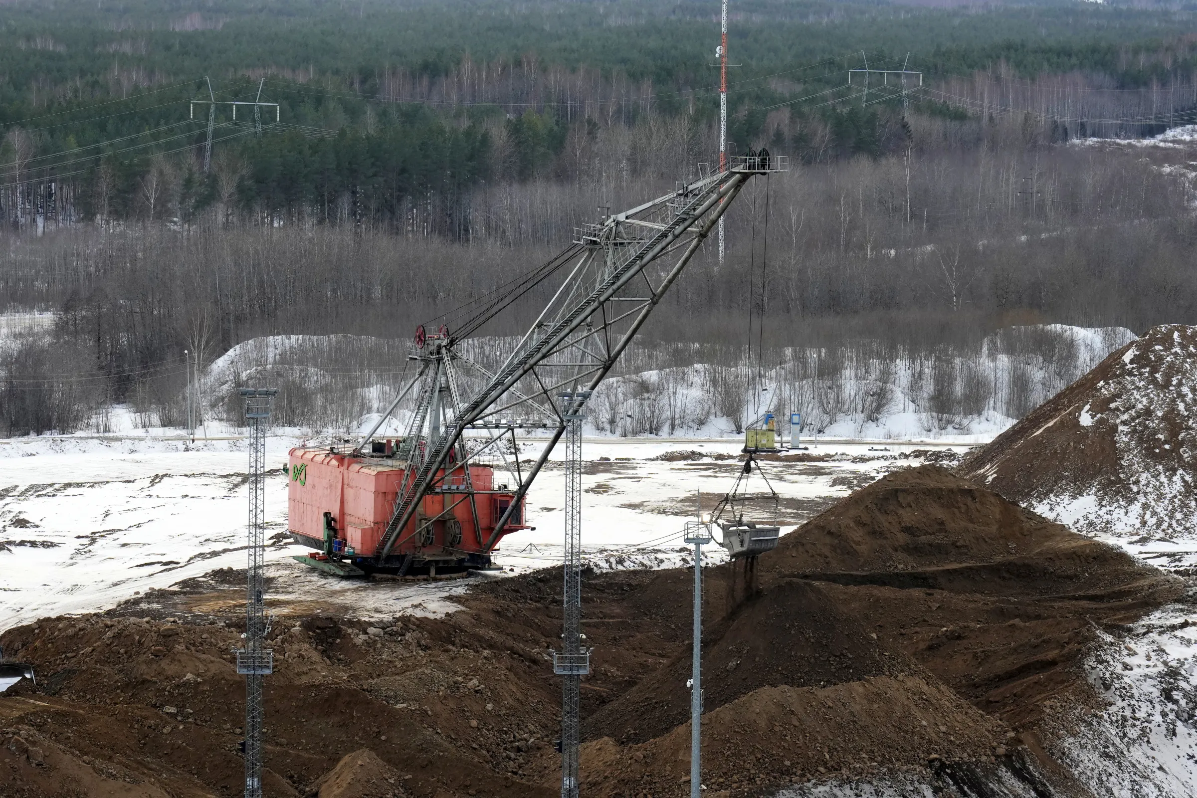 An excavator prepares oil shale for the power plant in Auvere, Estonia February 28, 2023. REUTERS/Ints Kalnins