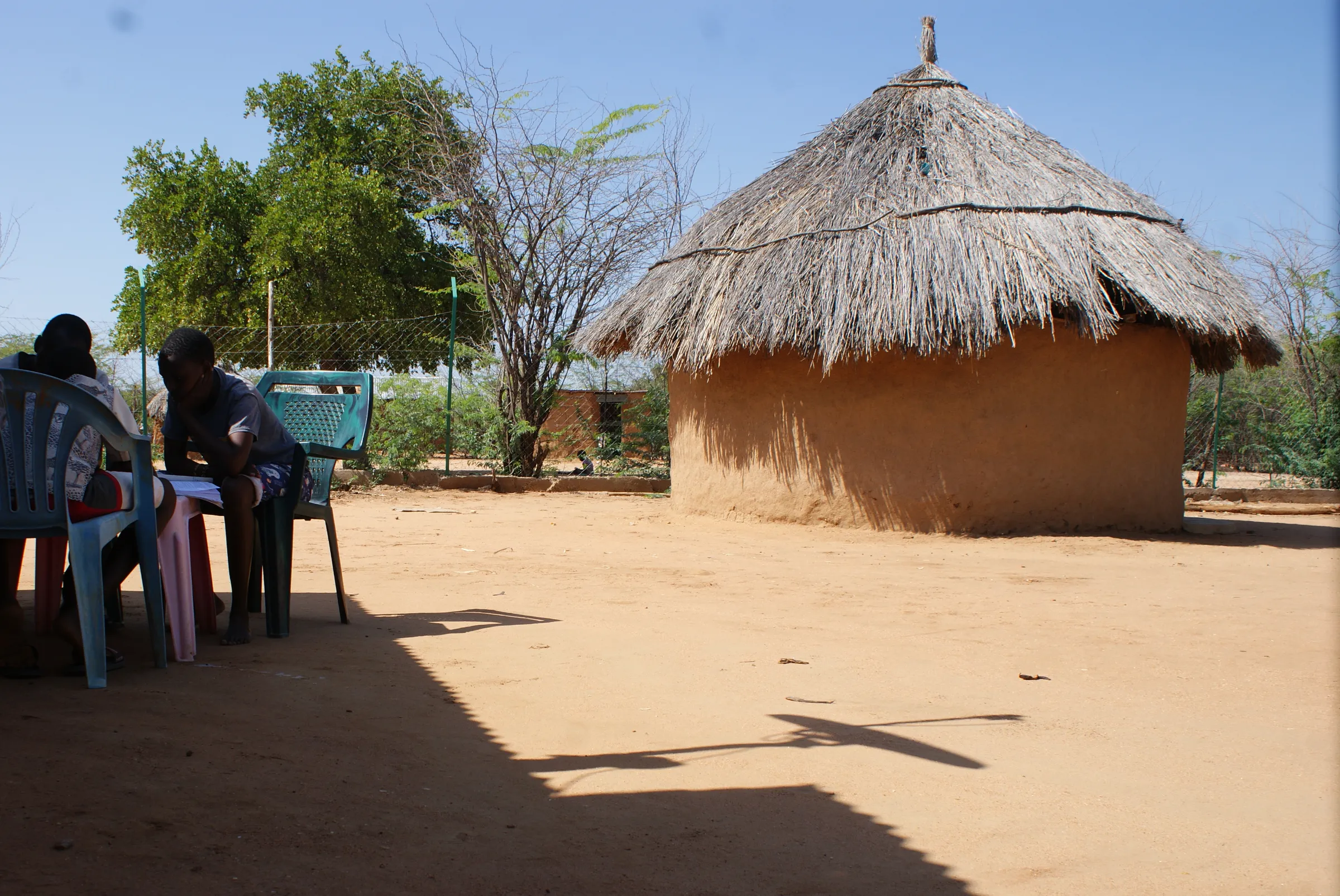 A thatched-roof house is seen on Simon Ewoi's property in Katilu village, northern Kenya, 19 September, 2022. THOMSON REUTERS FOUNDATION/Kagondu Njagi