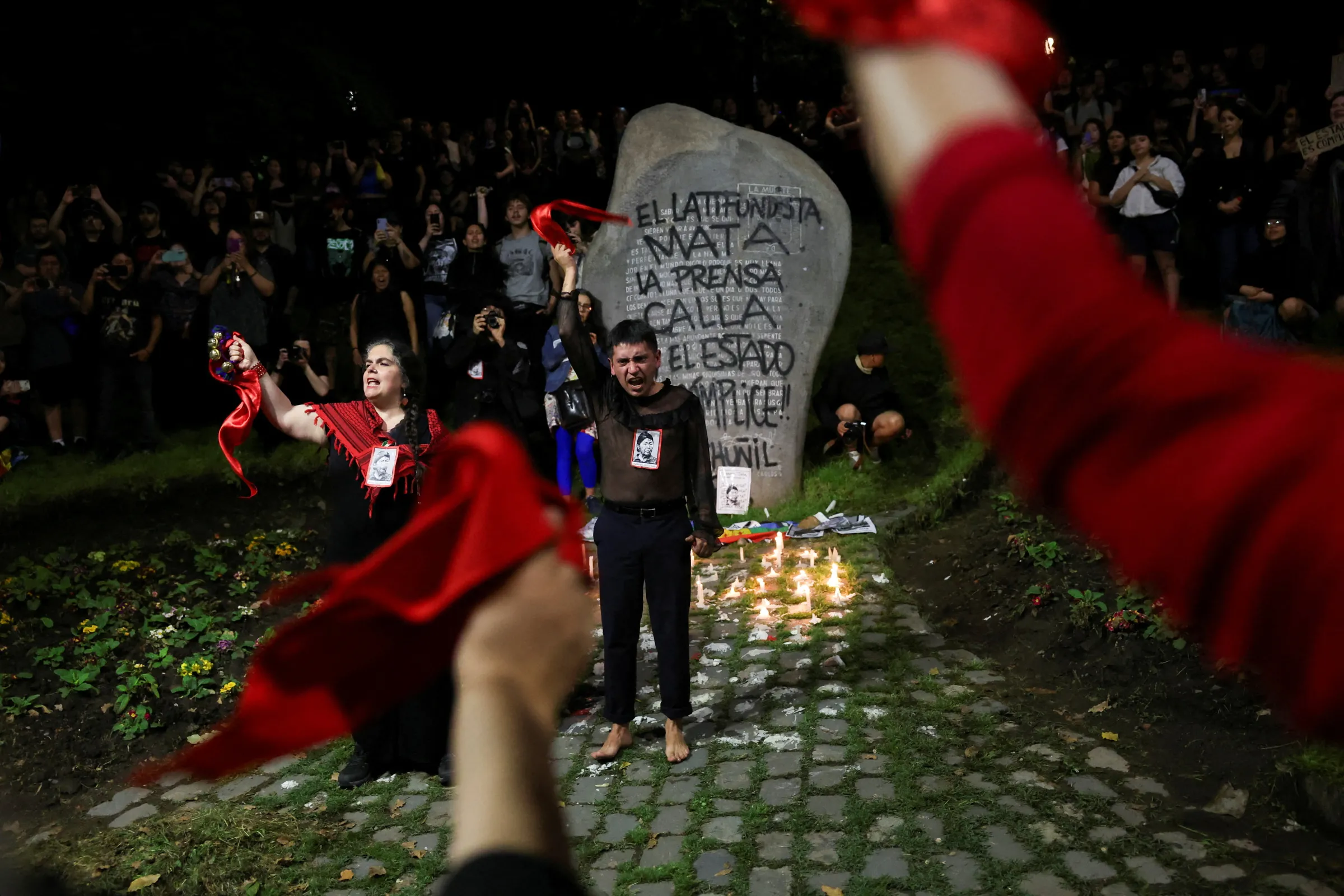 Demonstrators shout slogans during a protest in support of Mapuche leader Julia Chunil, a prominent defender of indigenous and environmental rights who disappeared in November 2024, in Santiago, Chile, October 2, 2025. REUTERS/Pablo Sanhueza
