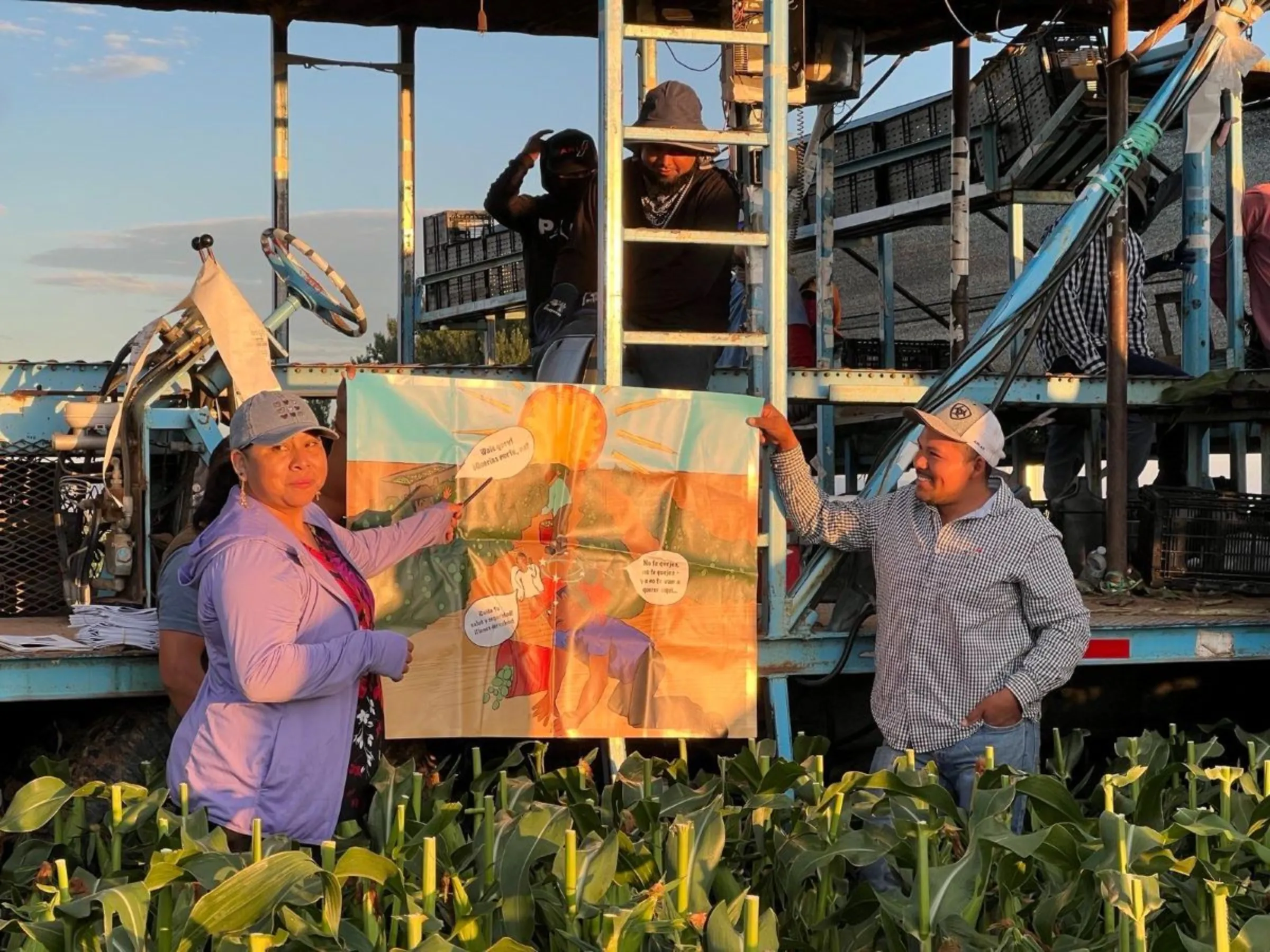 Workers carry out peer education on heat stress protections at a farm in the U.S. state of Georgia in December 2022. Fair Food Program/Handout via Thomson Reuters Foundation.