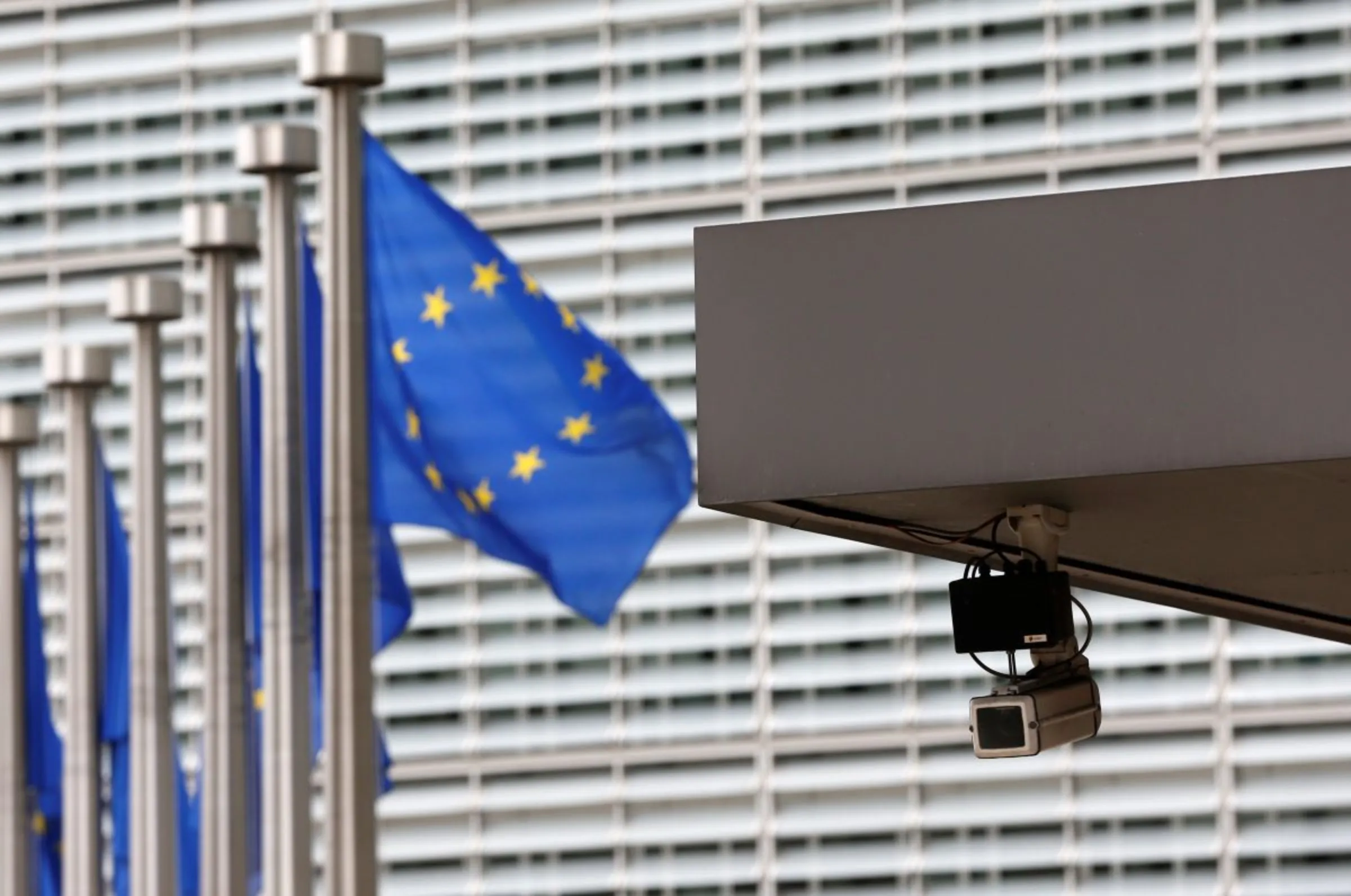 A security camera is seen at the main entrance of the European Union Commission headquarters in Brussels July 1, 2013. REUTERS/Francois Lenoir