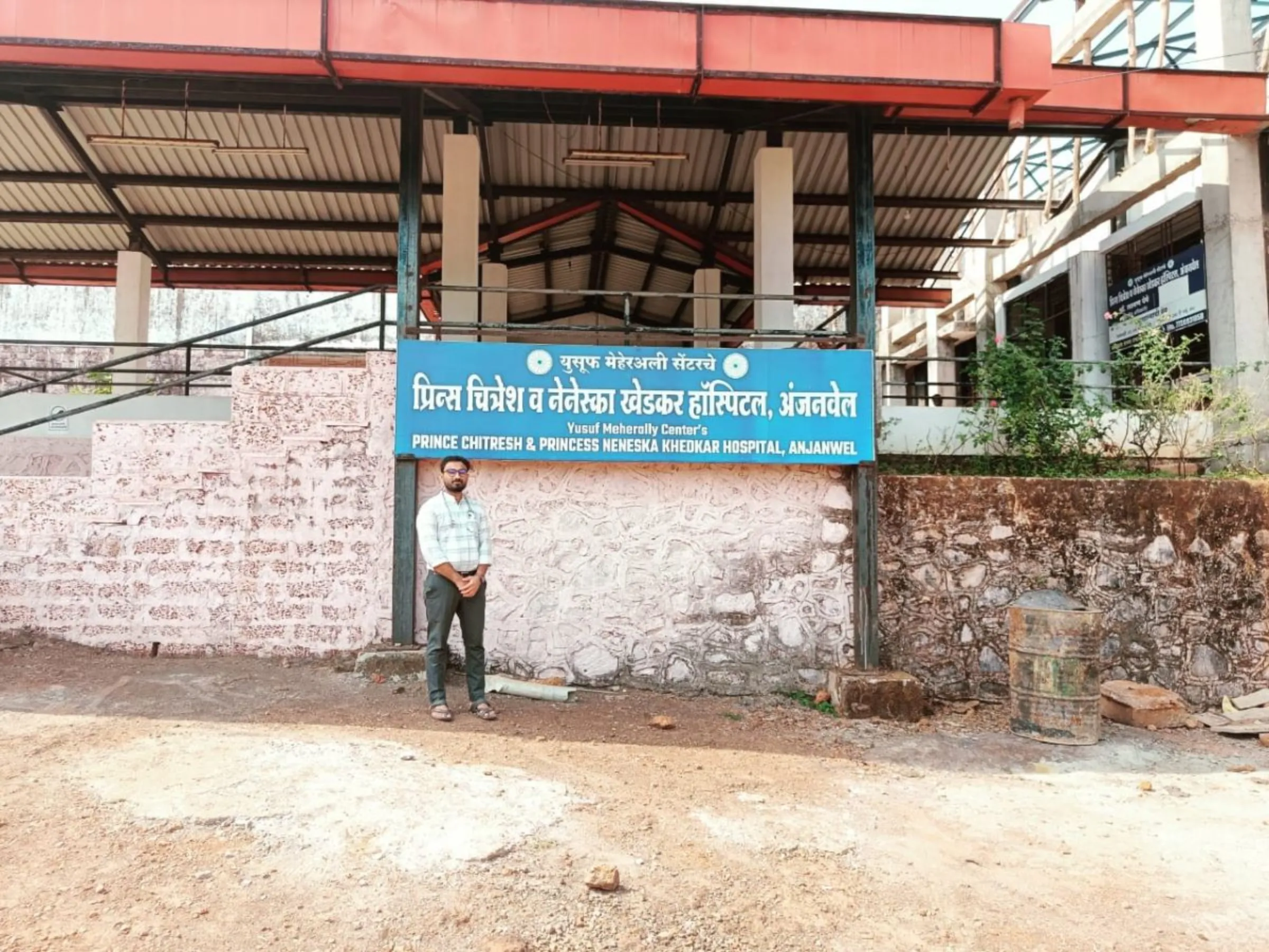 Dr. Lakshman Yeme stands outside the Anjanwel hospital, which has been affected by the government’s crackdown on foreign funding for NGOs, Anjanwel, India,  May 24, 2024. Thomson Reuters Foundation/Kunal Purohit.