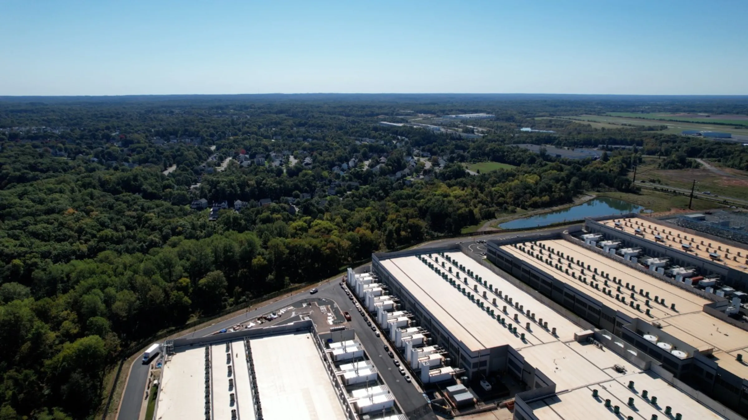 A data center complex in Prince William County, Virginia, sits near the Great Oak community, seen in October 2022