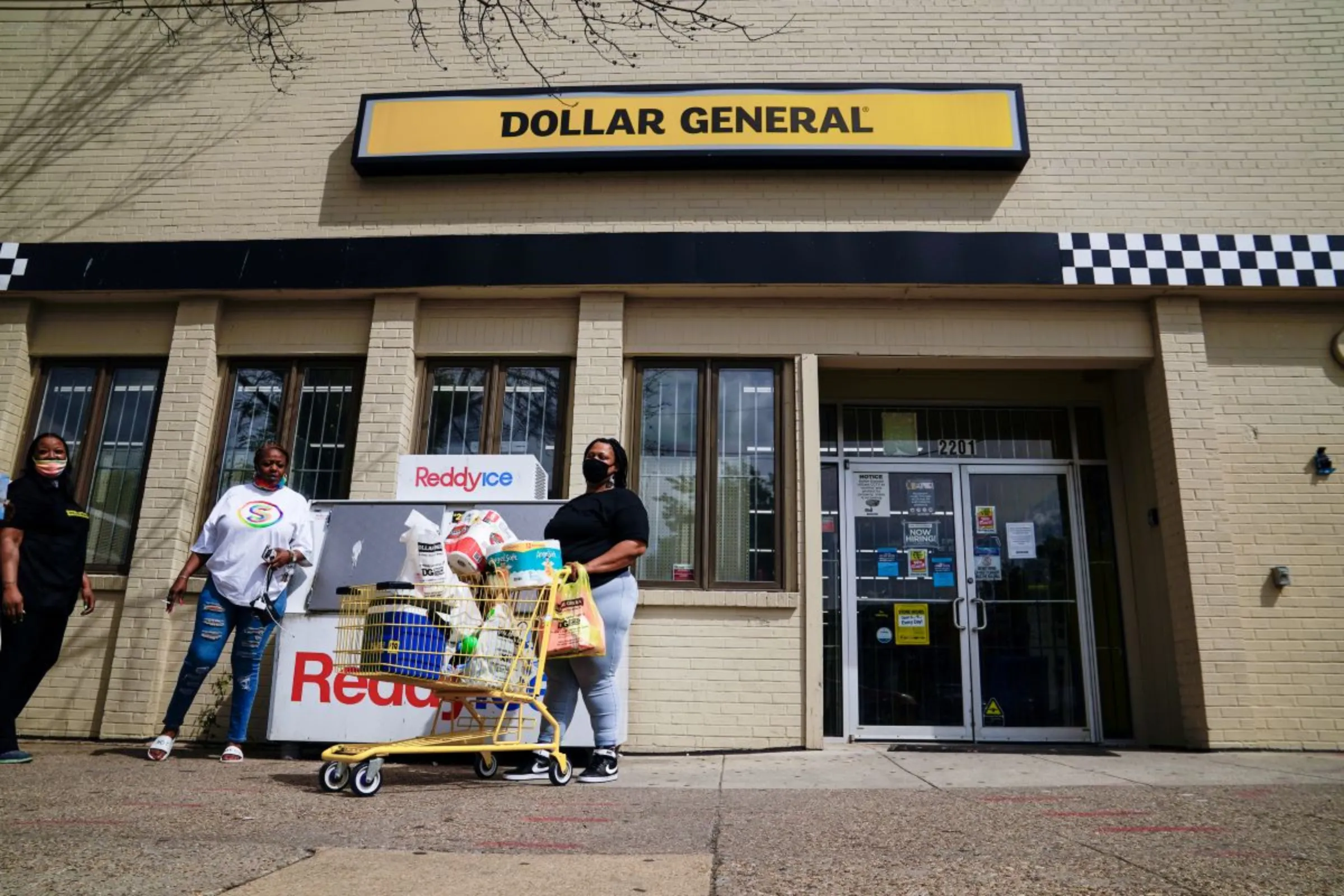 A person exits a Dollar General store in Mount Rainier, Maryland, U.S., June 1, 2021. REUTERS/Erin Scott