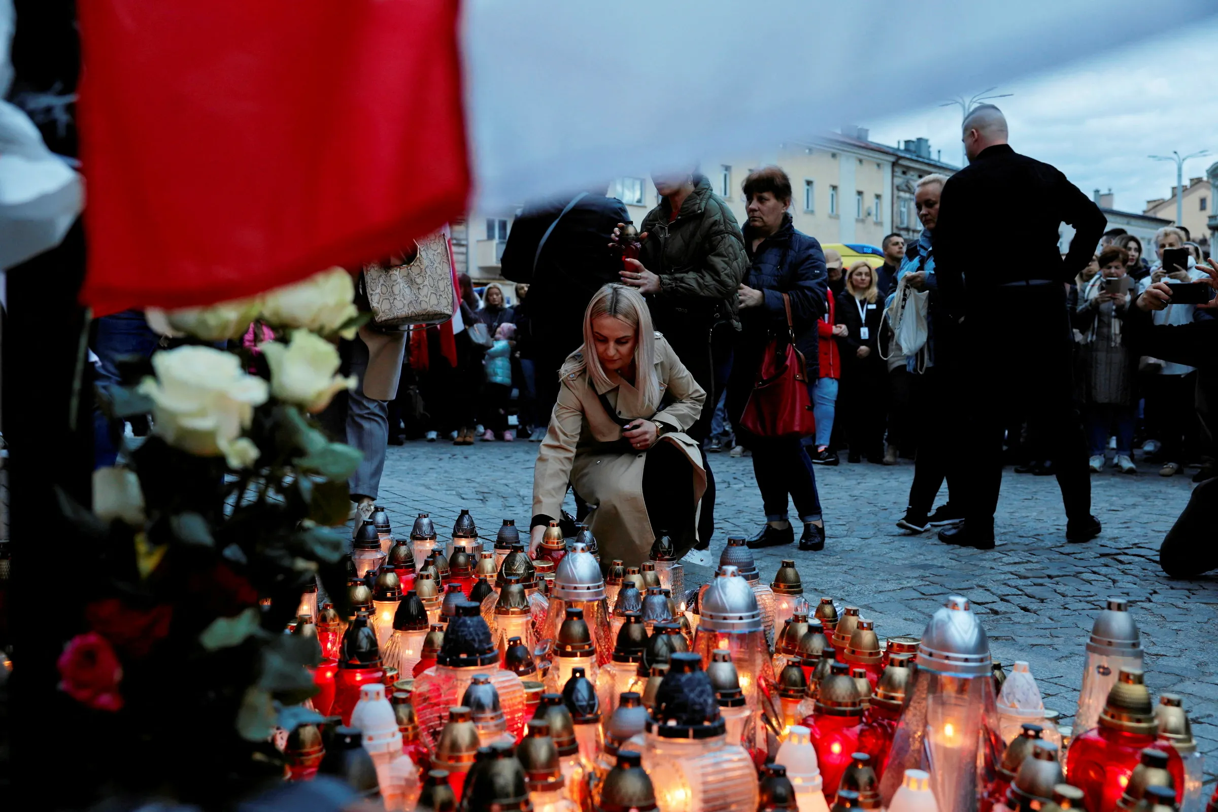 Mourners gather to hold a vigil for the Polish aid worker Damian Sobol who was killed by the Israeli army in Gaza, among seven people working for the charity World Central Kitchen (WCK) who were killed in an Israeli airstrike, in Przemysl, Poland, April 4, 2024. Patryk Ogorzalek/ Agencja Wyborcza.pl via REUTERS