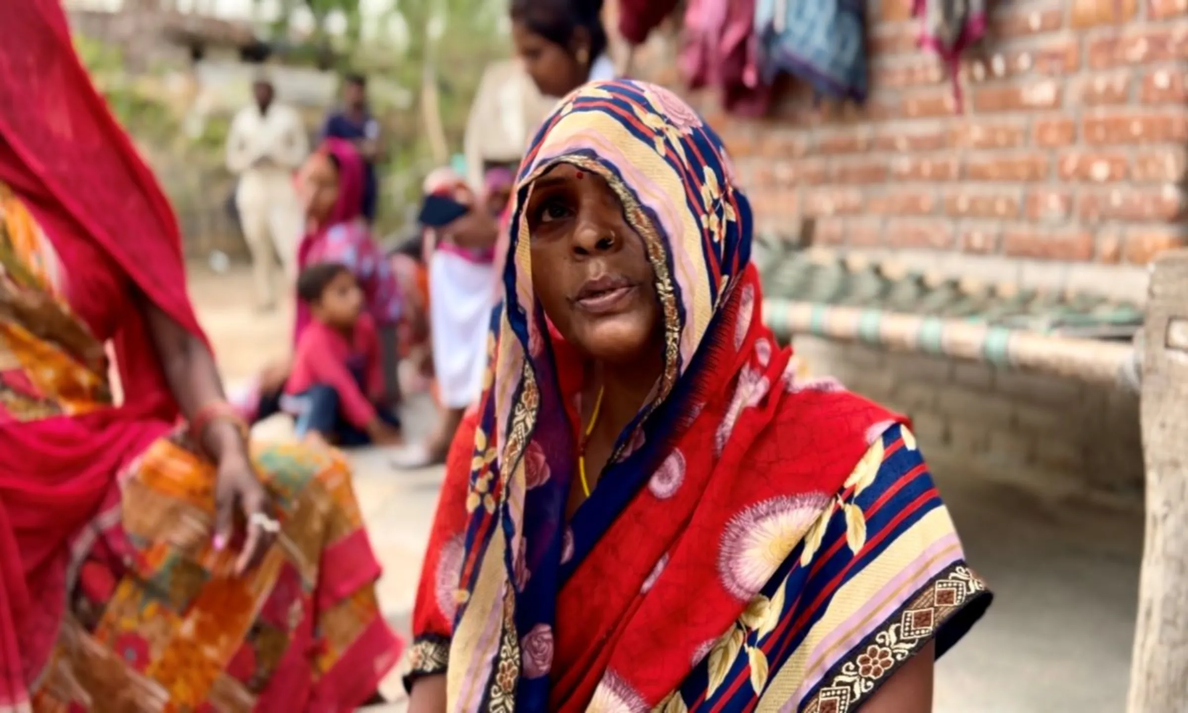 Woman farmer Urmila is pictured in her village in Banda, India, May 15, 2024. Thomson Reuters Foundation/Bhasker Tripathi