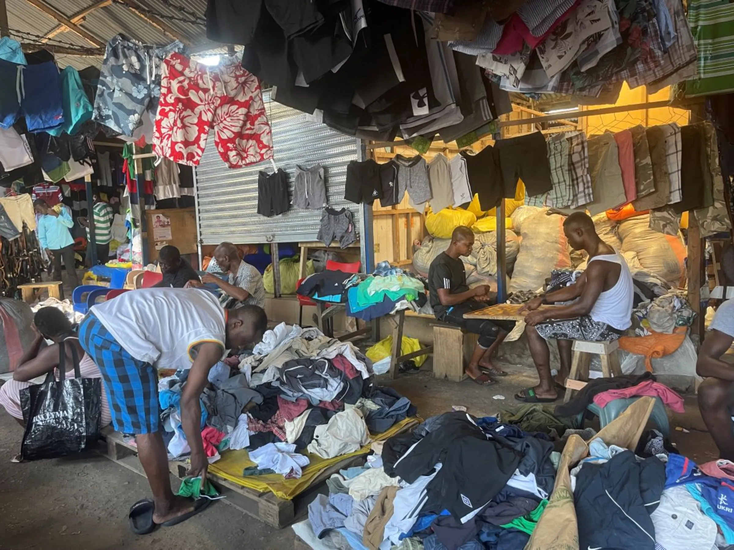 Traders and shoppers at the Kantamanto, the world’s largest secondhand clothing market in Accra, Ghana on June 13, 2023. Bukola Adebayo/ Thomson Reuters Foundation