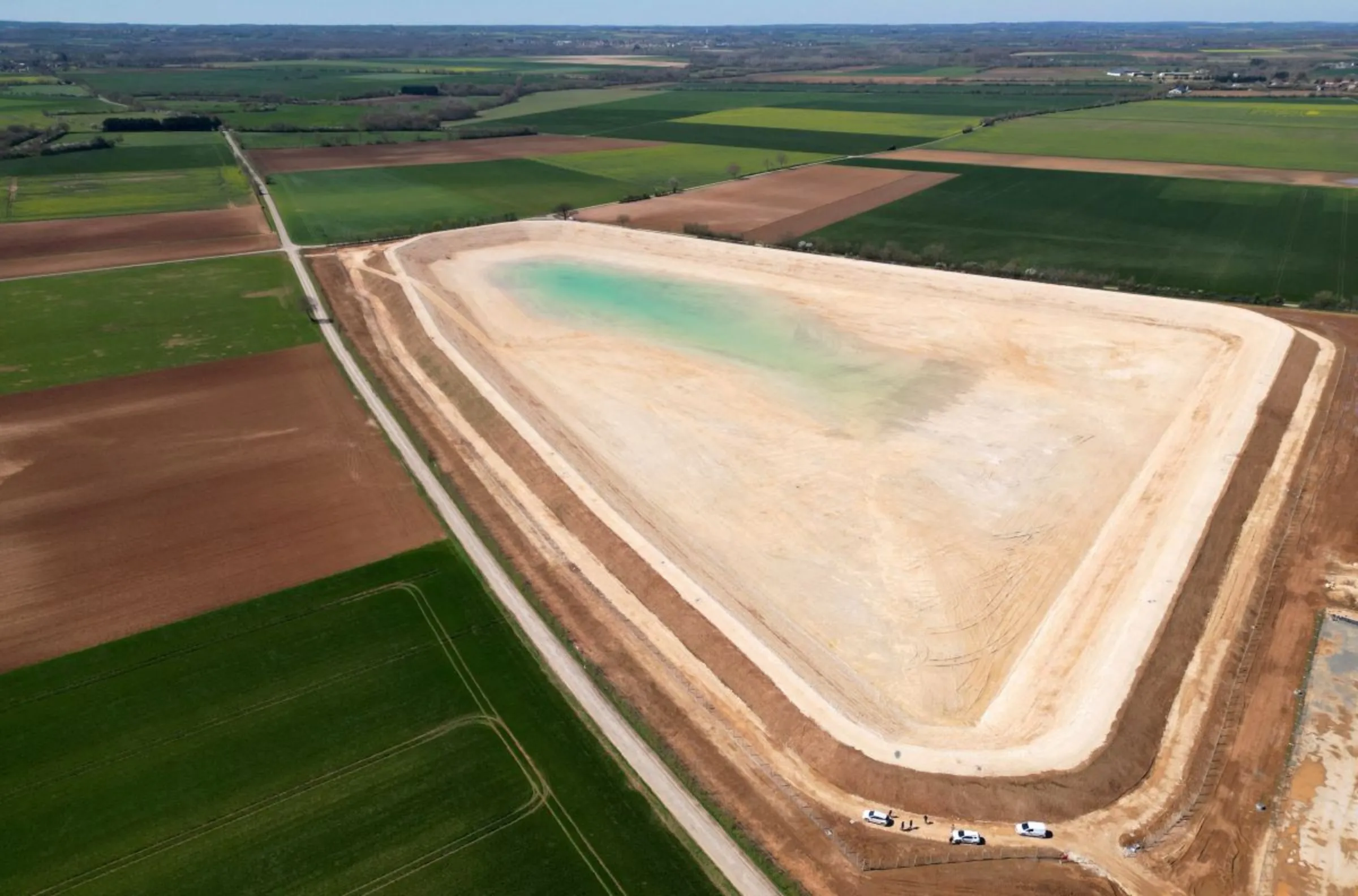 An aerial view shows the construction site of new water storage infrastructure for agricultural irrigation in western France, in Sainte-Soline, France April 4, 2023. REUTERS/Stephane Mahe