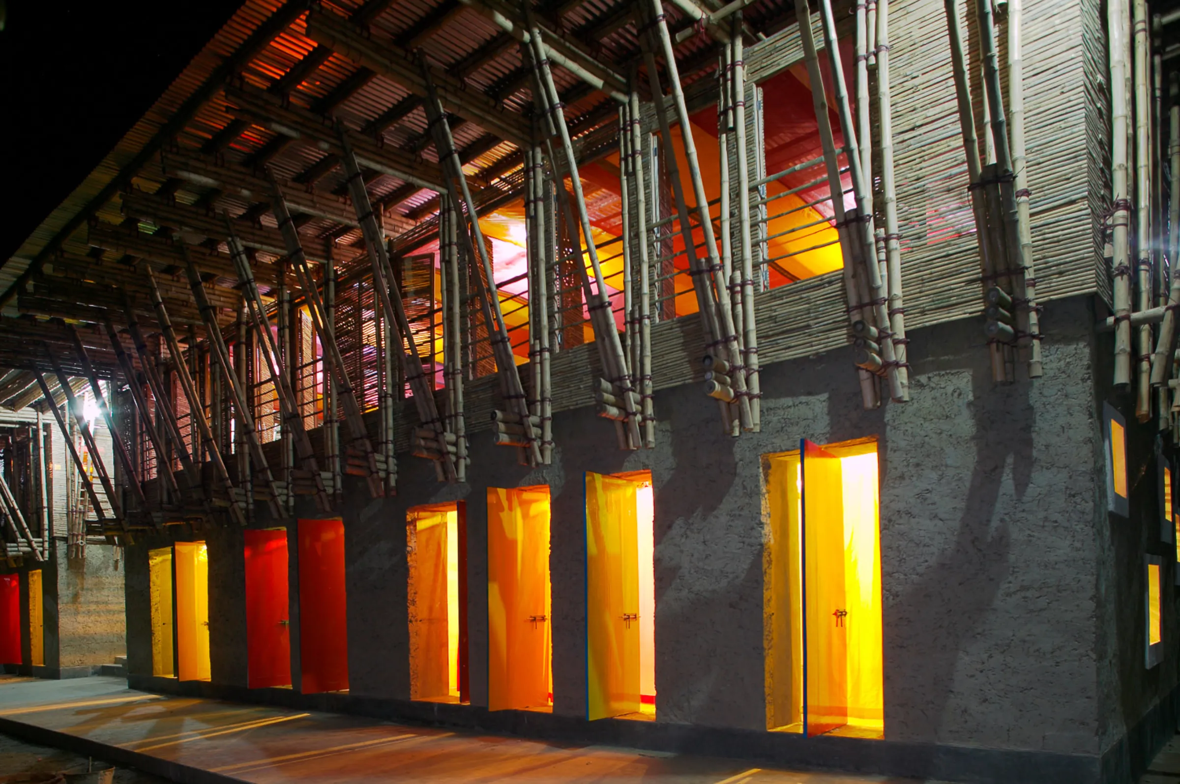 The METI school designed by architect Anna Heringer in northern Bangladesh is seen at night. Kurt Hoerbst/Handout via Thomson Reuters Foundation