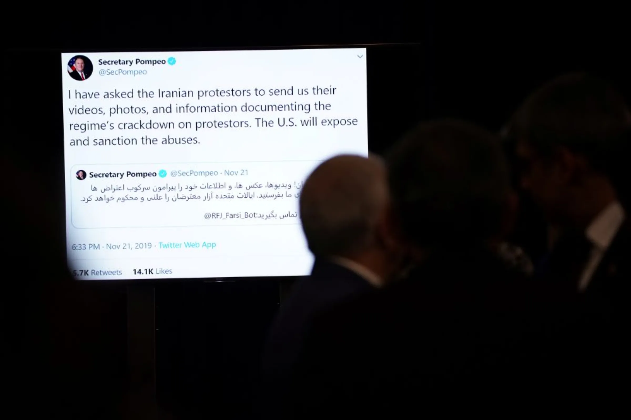 A tweet is projected on screens before remarks from U.S. Secretary of State Mike Pompeo (not pictured) on human rights in Iran at the State Department in Washington, U.S., December 19, 2019