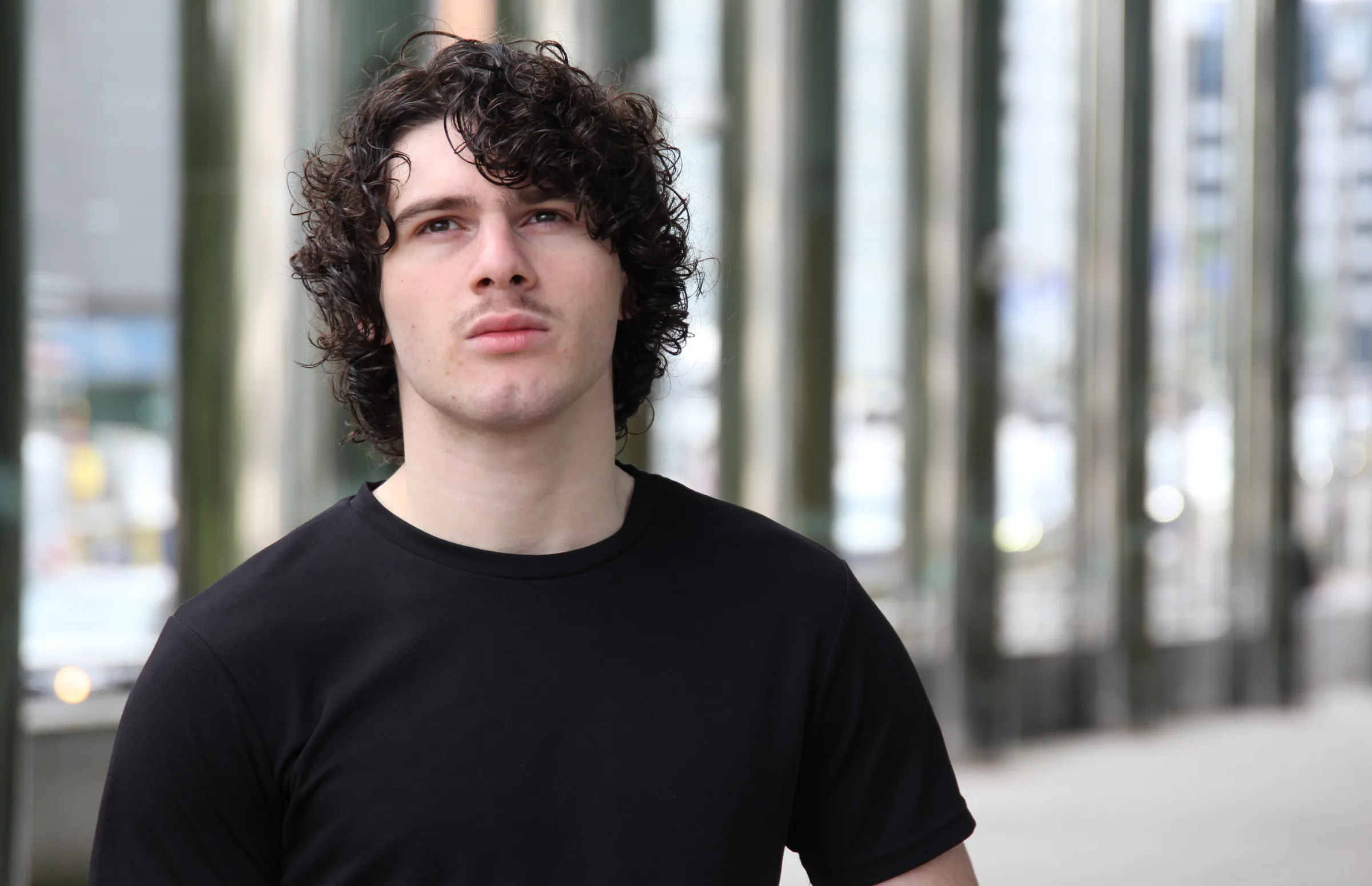 Lucas Ablotia LGBTQ+ activist from Georgia pictured near EU institutions in Brussels, Belgium August, 2024. Thomson Reuters Foundation/Joanna Gill