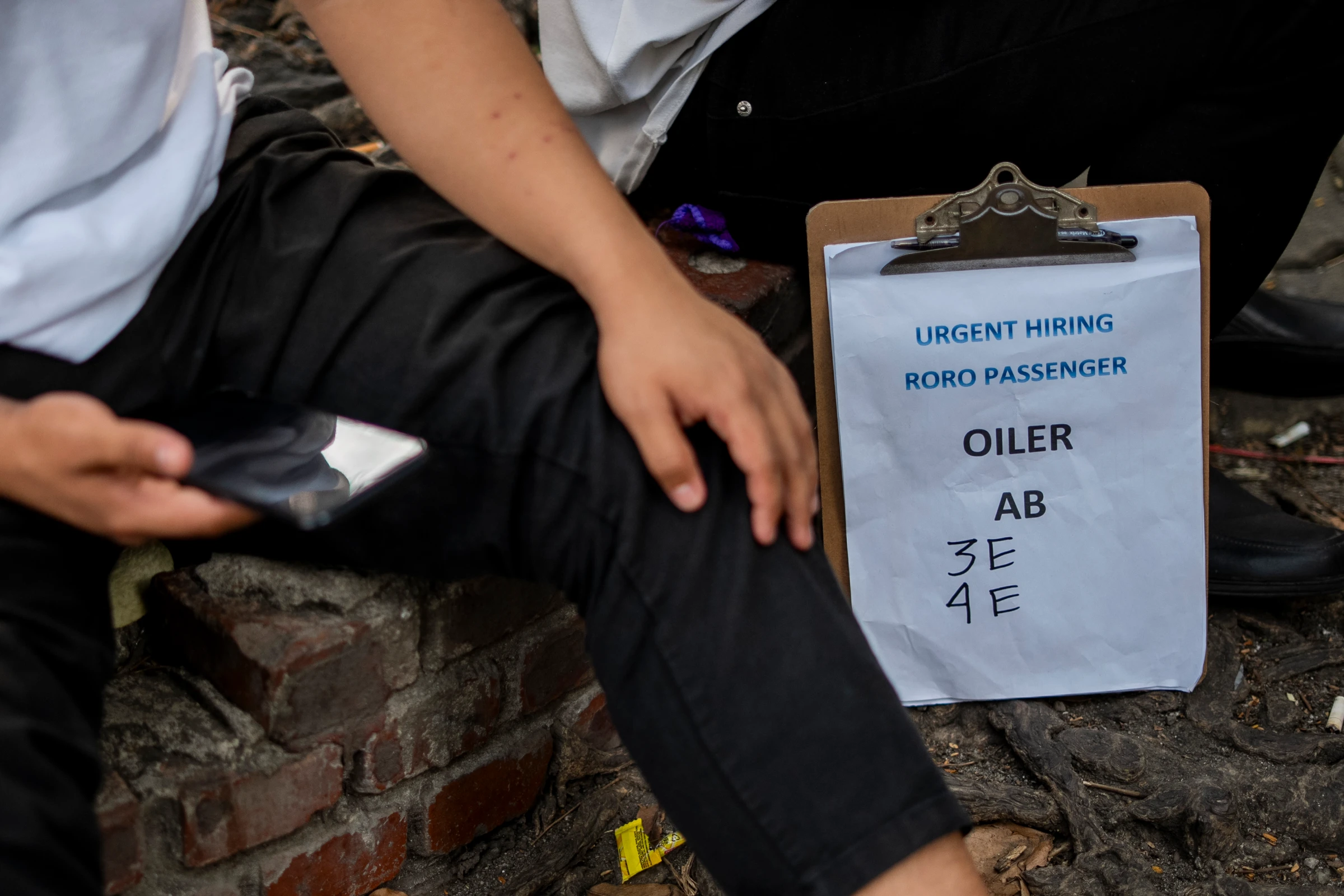 A poster advertises seafaring jobs on Kalaw Avenue in Manila where seamen and fishermen are recruited, in Manila, Philippines, May 6, 2025. Thomson Reuters Foundation/Lisa Marie David