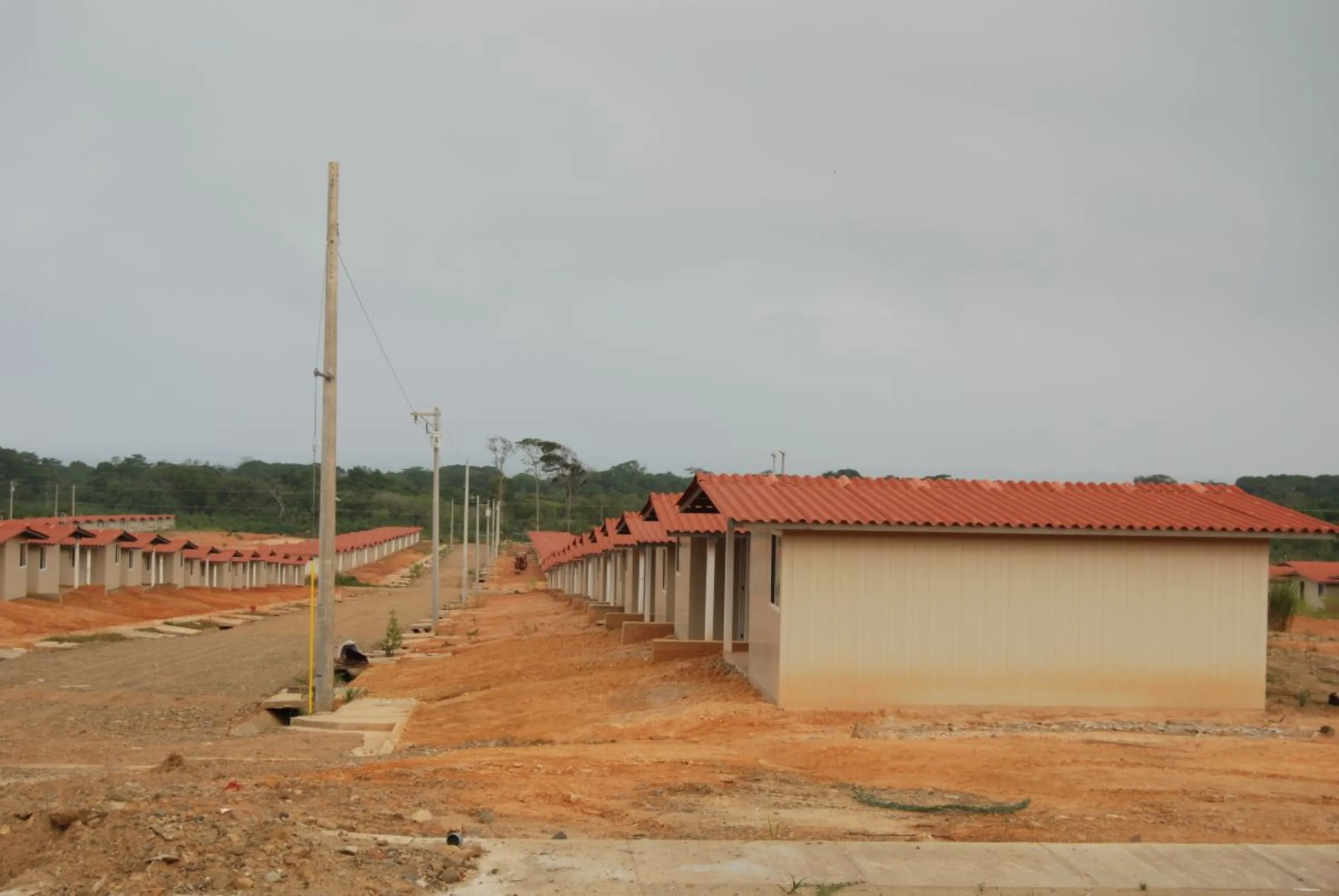 Houses in the new relocation site of the Guna people, known as La Barriada, on the mainland in the Guna Yala region, Panama. February 18, 2024. Thomson Reuters Foundation / Anastasia Moloney