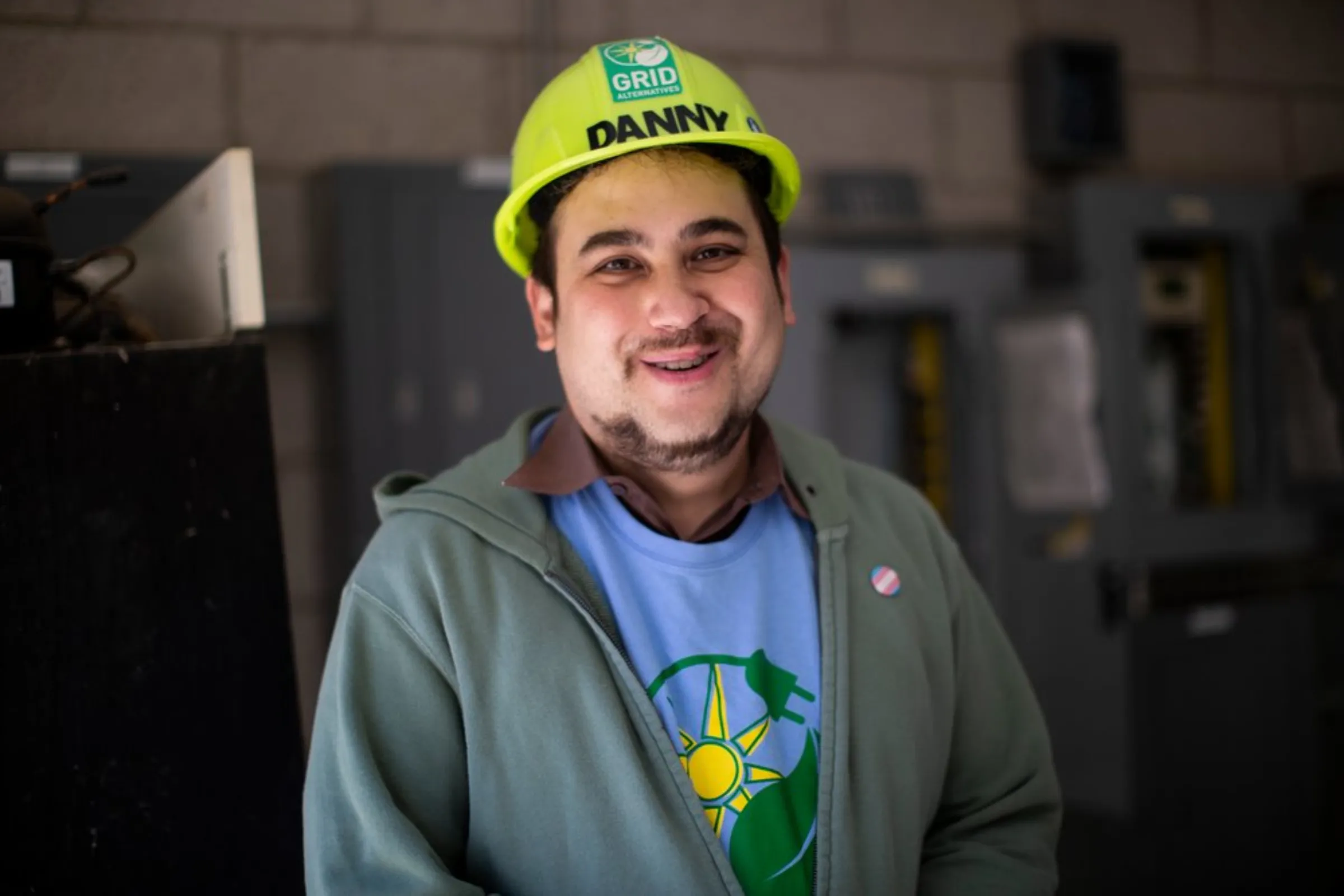 Danny Hom wears a hard hat while working at the Audubon Center, where his team is installing solar panels, in Los Angeles, California, May 21, 2021