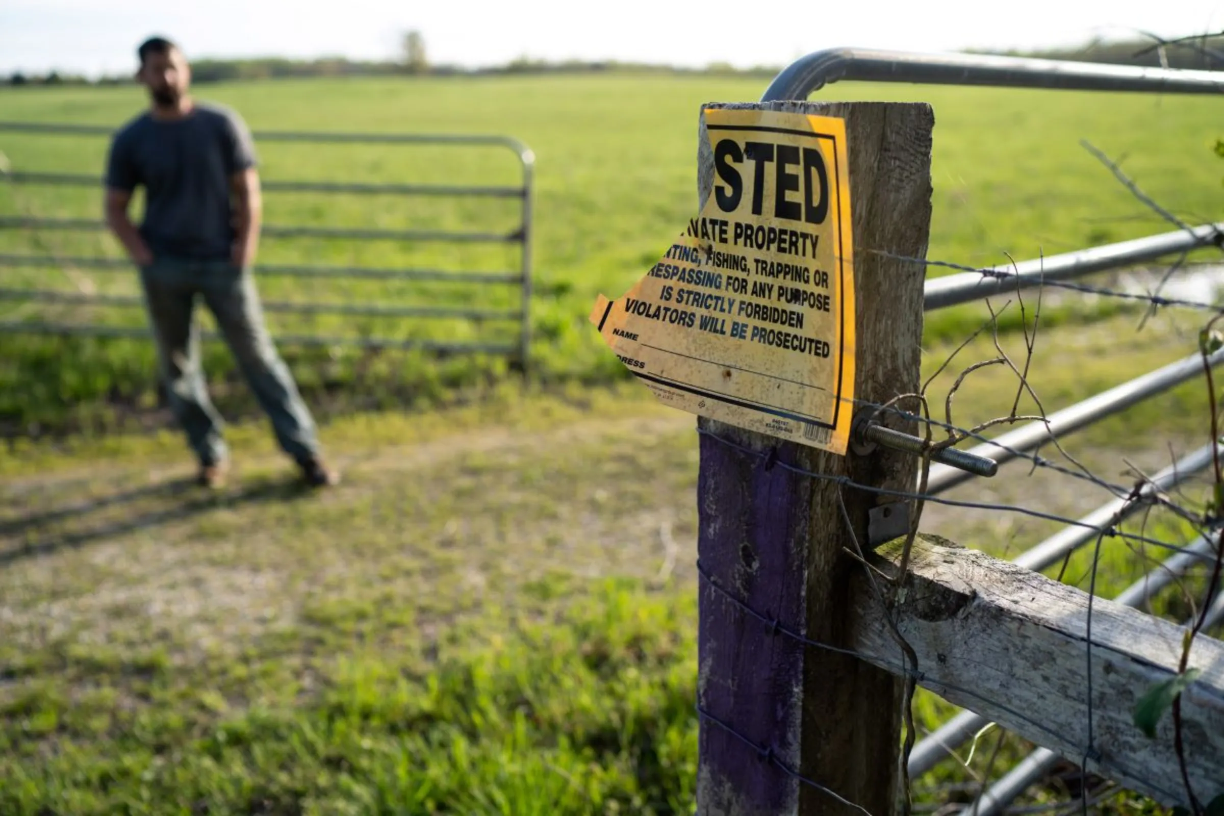 Hunter Hollingsworth stands on his property in Benton County, Tennessee in this undated photo. Institute for Justice/Handout via Thomson Reuters Foundation