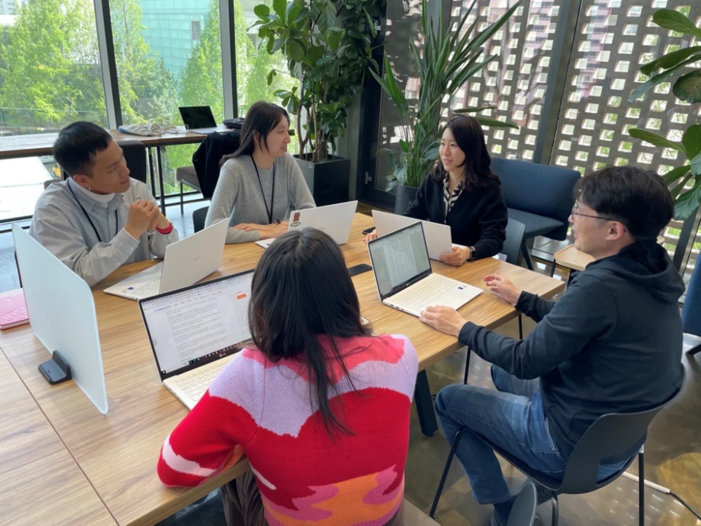 Jihyeon Ha holds a meeting with colleagues at the Solutions For Our Climate office in Seoul, South Korea, April 13, 2023