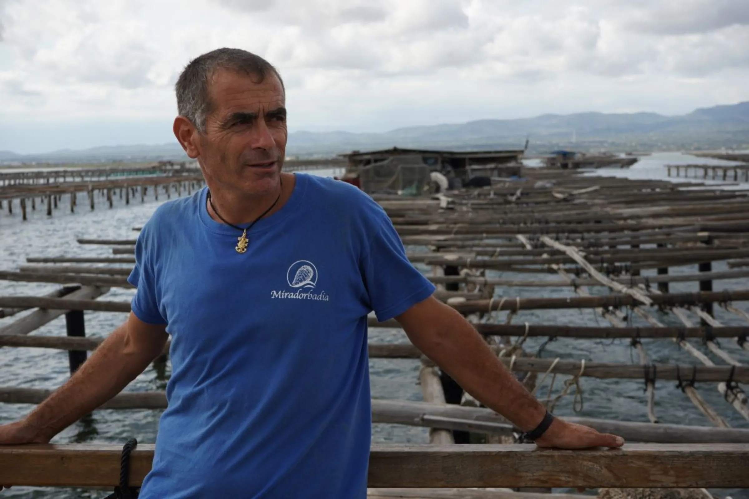 Xavier Cabrera poses at his mussel farm, in the Ebro Delta region of Catalunya, Spain, September 1, 2023. A decade ago, Cabrera harvested some 10,000 tonnes of mussels each season. But for the past few years, production has tumbled to around 1,500 tonnes. Thomson Reuters Foundation/Naomi Mihara