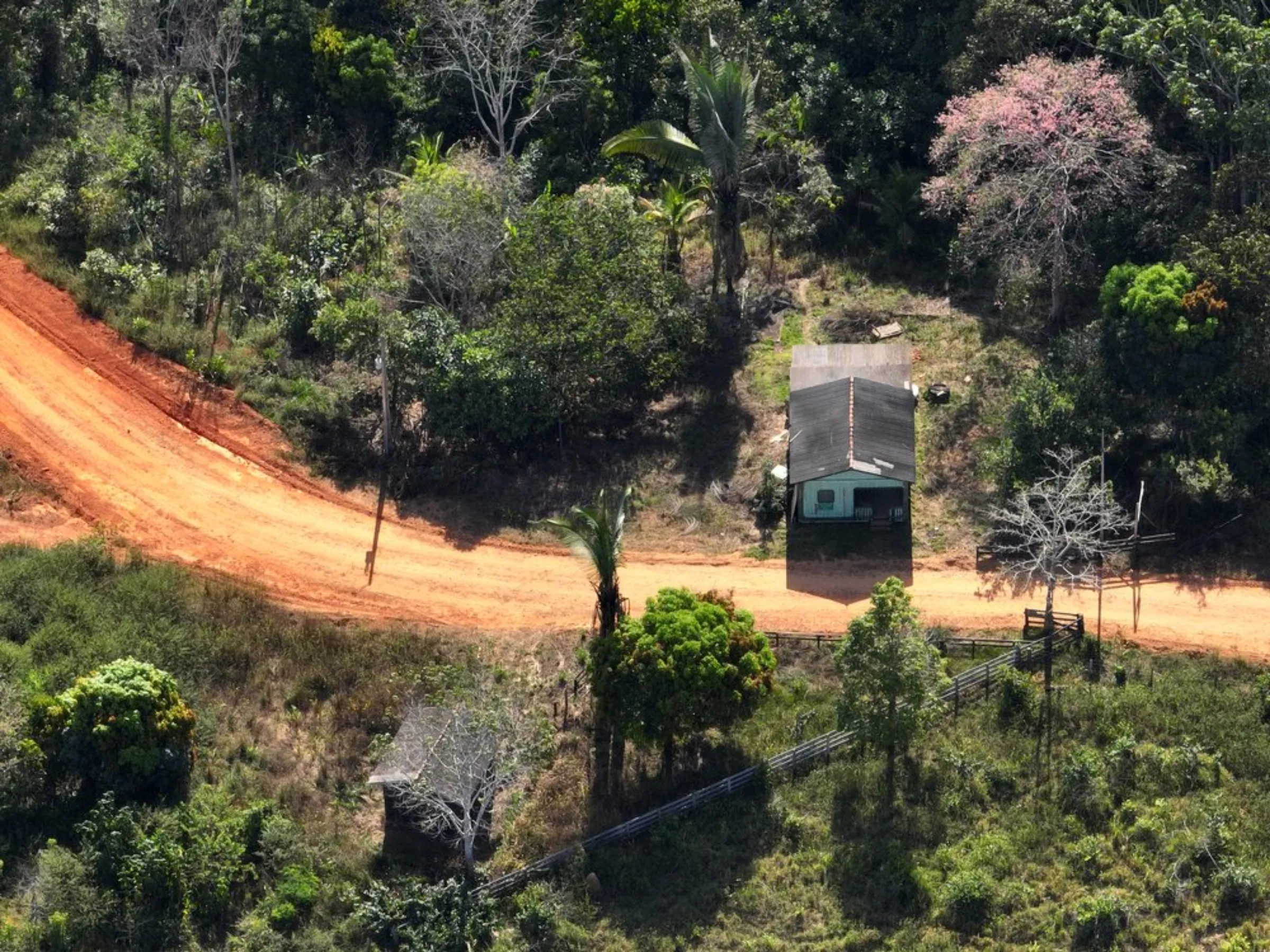 An aerial view of the entrance to land that used to belong to the Florestal Santa Maria project, but is now owned by Junp Madeiras, a logging company in Colniza, in the state of Mato Grosso, Brazil, May 30, 2022