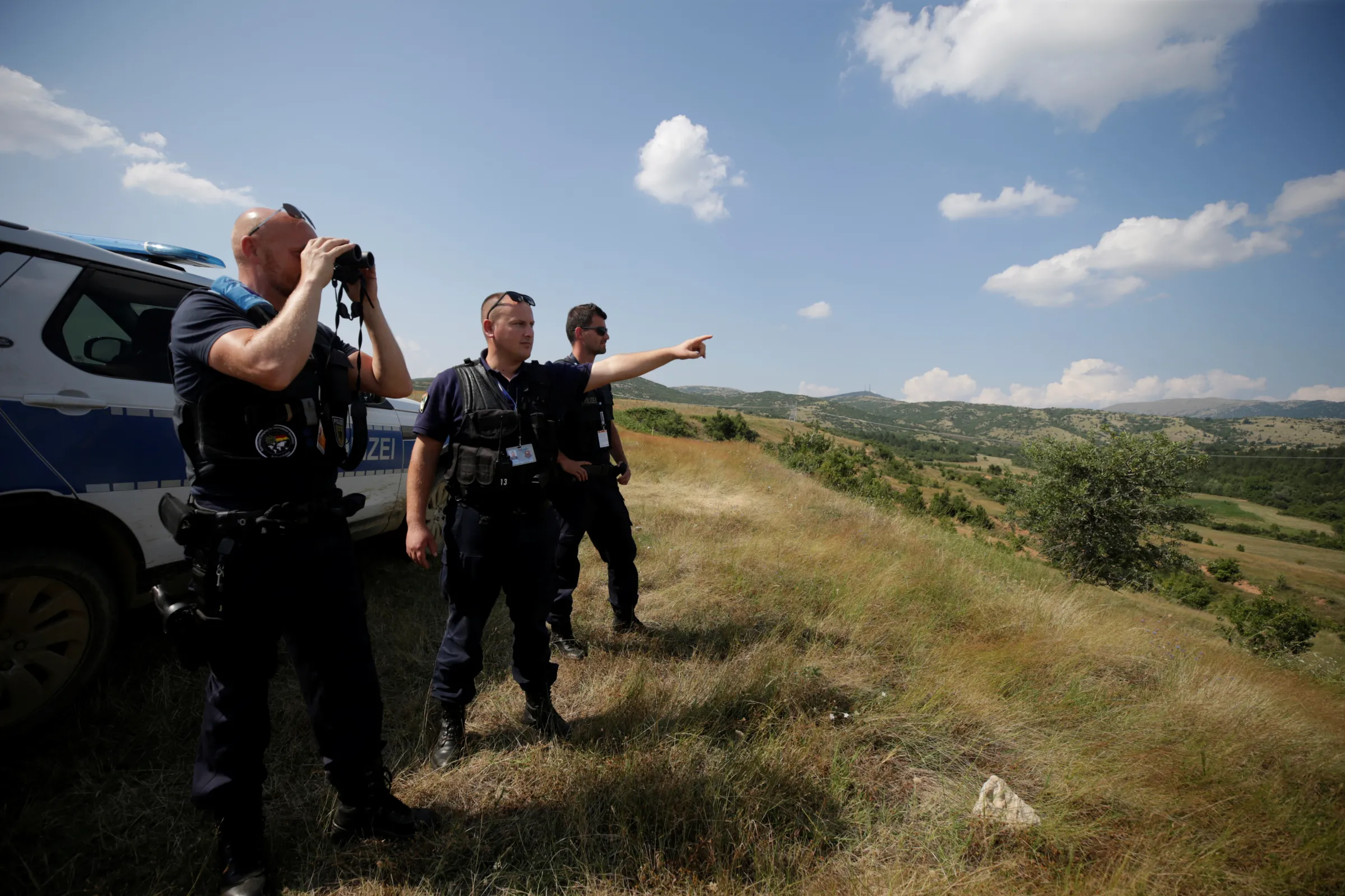 Members of the European Border and Coast Guard Agency (FRONTEX) patrols near Albania-Greece border, in Kapshtica near Korce, Albania, July 23, 2019. REUTERS/Florion Goga