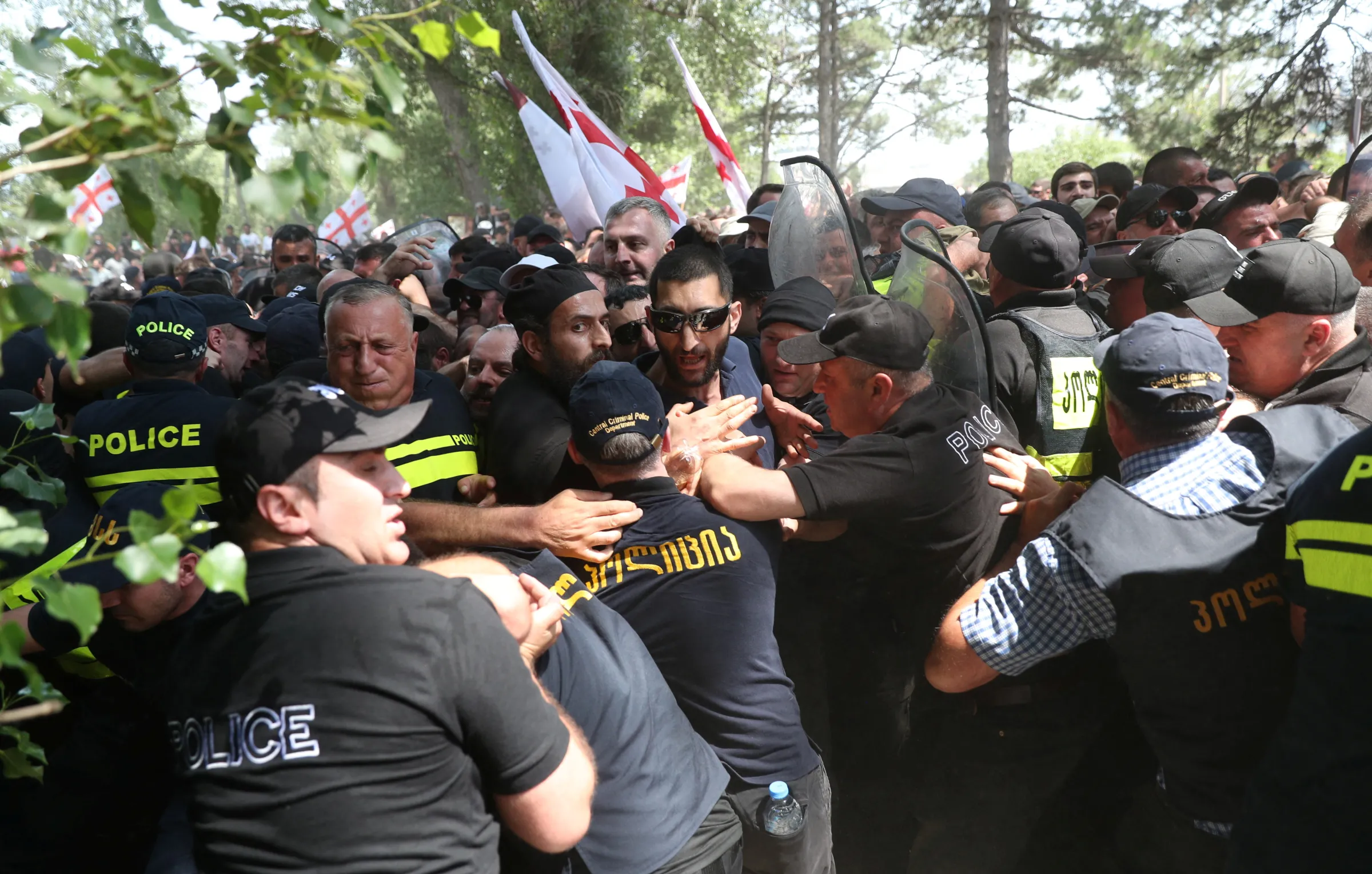 Anti-LGBTQ protesters scuffle with police as they try to break into the site of Tbilisi Pride Fest, in Tbilisi, Georgia July 8, 2023. REUTERS/Irakli Gedenidze
