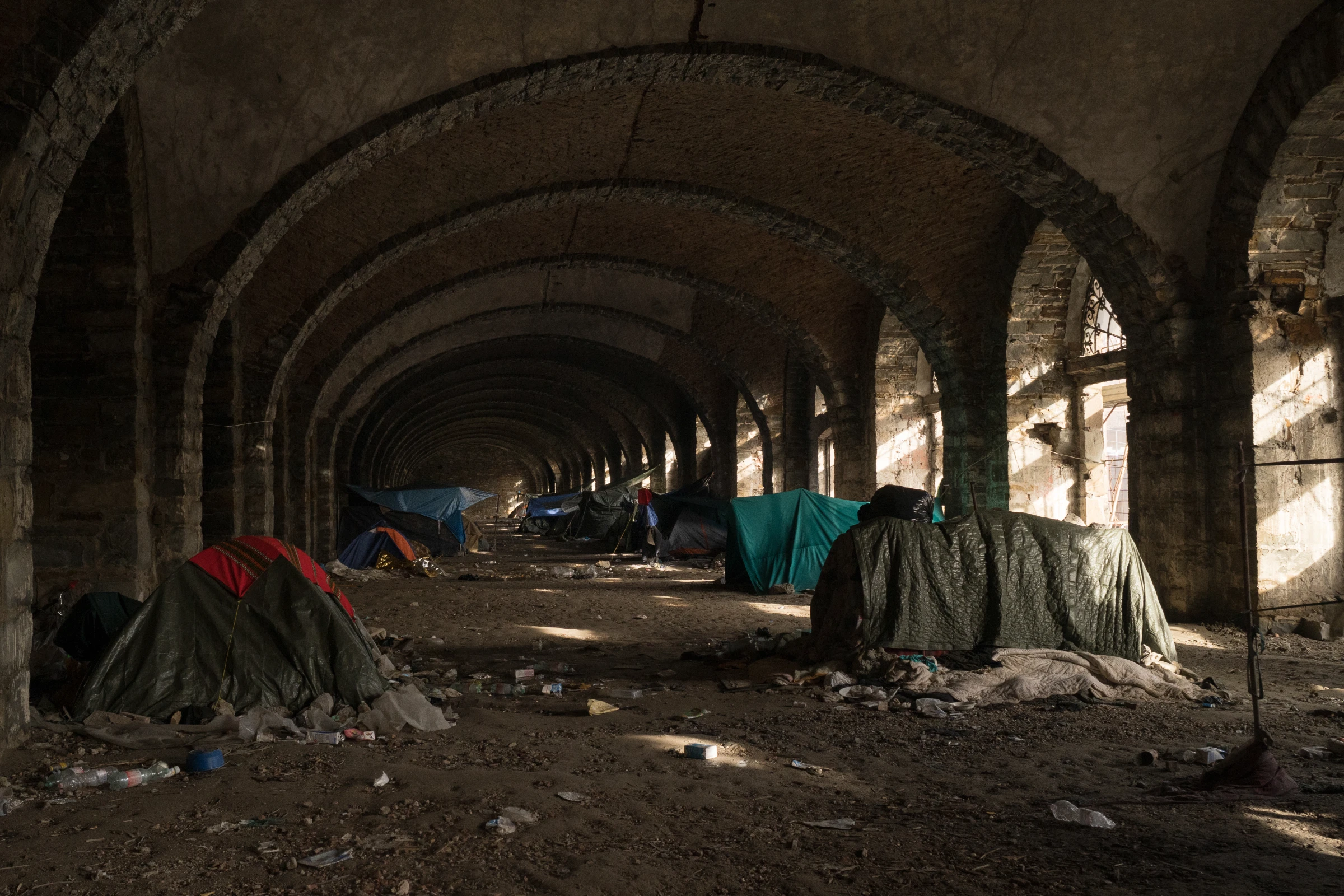 People on the move camp out in abandoned silos, in Trieste, Italy. March 5, 2024. Francesco Pistilli/International Rescue Committee/Handout via Thomson Reuters Foundation