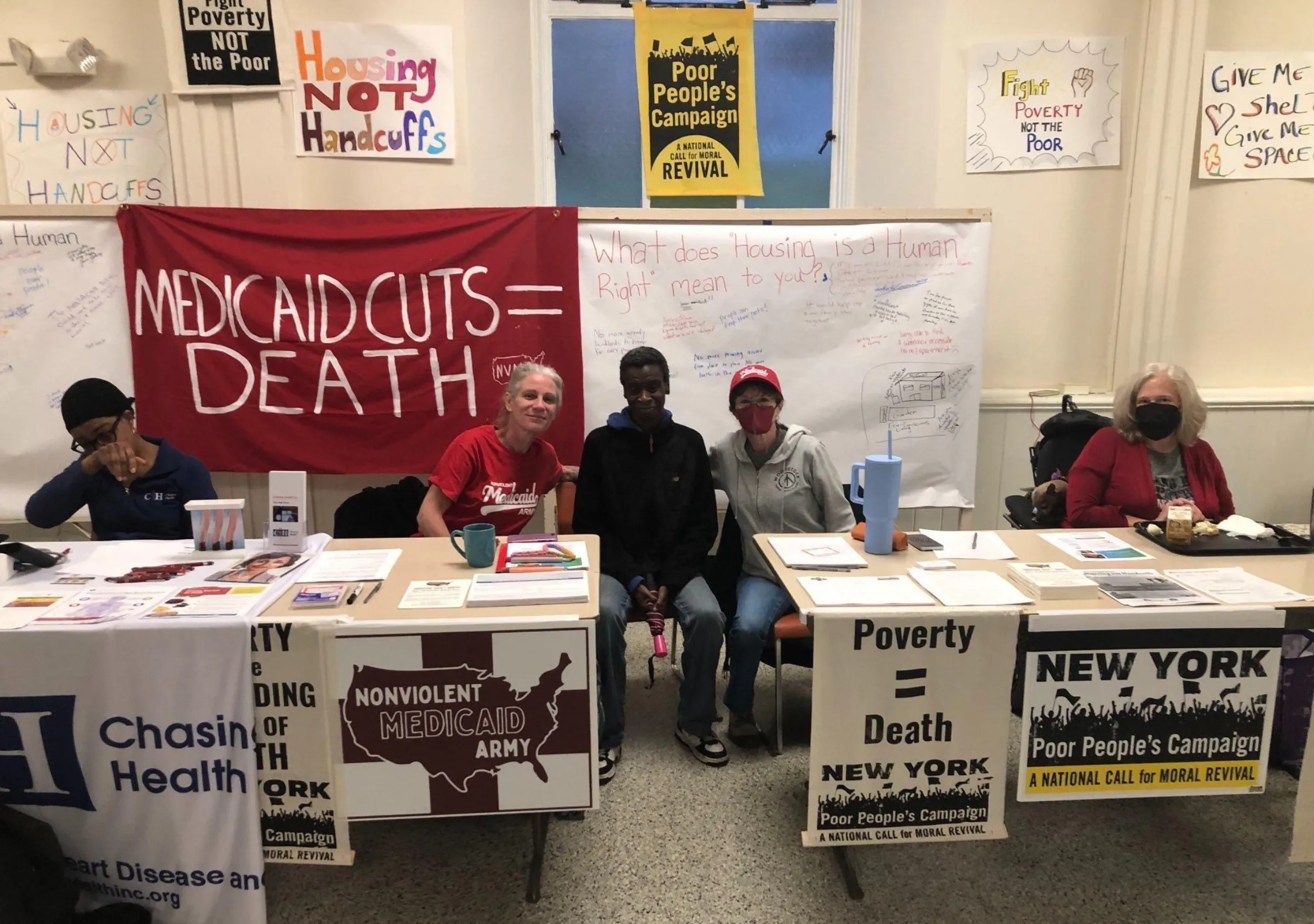 People take part in a free “people’s clinic” in Albany, New York, on September 25, 2024. Nonviolent Medicaid Army/Handout via Thomson Reuters Foundation