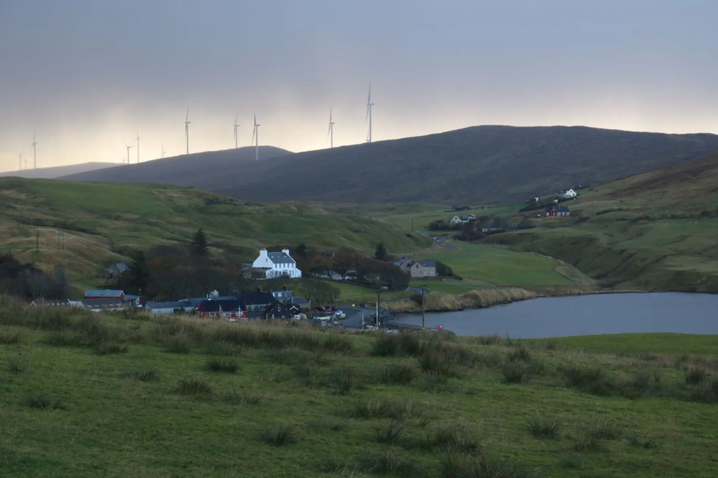 Homes sit in the small village of Voe about 100 miles north of mainland Scotland, in Voe, Shetland, October 31, 2023. Thomson Reuters Foundation/Jack Graham