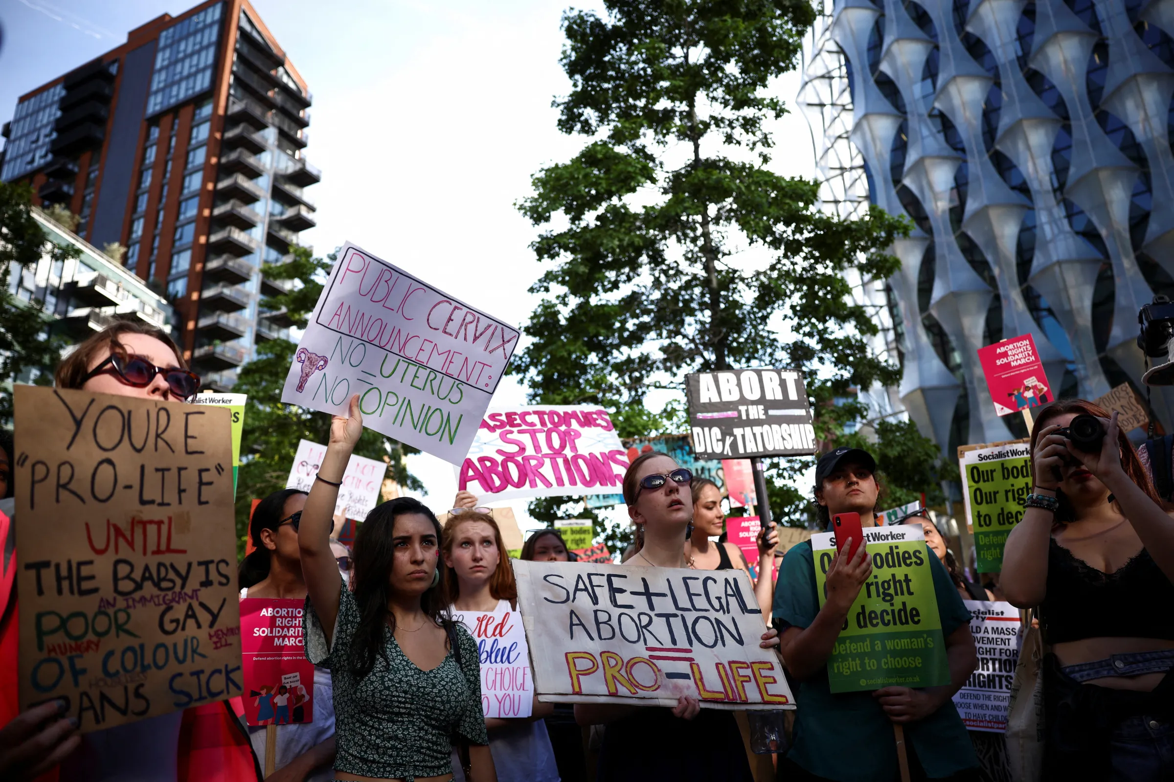 Protesters hold banners during Abortion Rights Solidarity demonstration, after the U.S. Supreme Court overturned Roe v Wade decision that legalised abortion, outside the U.S. embassy in London, Britain July 9, 2022.