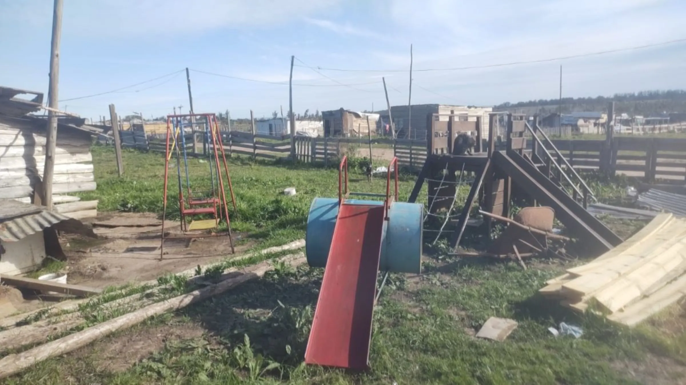 A children's playground is portraited in Nuevo Comienzo, a poor neighborhood on the outskirts of Montevideo. Thomson Reuters Foundation/ Fabiana Molina.