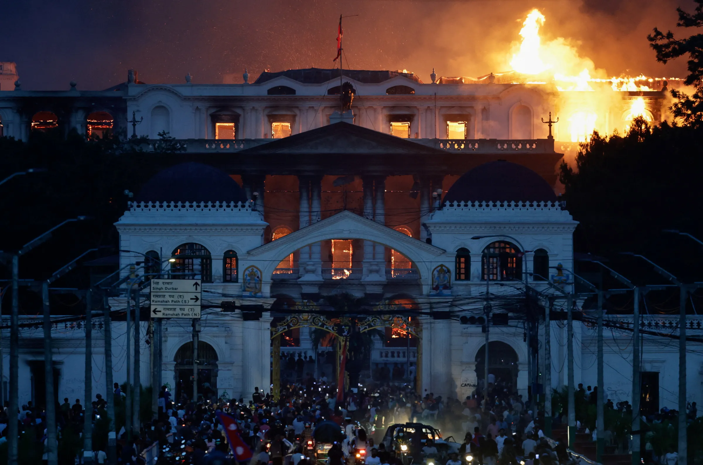 Flames rise from the complex that houses the Nepali prime minister's office and other ministries, amid anti-corruption protests triggered by a social media ban which was later lifted in Kathmandu, Nepal, September 9, 2025. REUTERS/Navesh Chitrakar